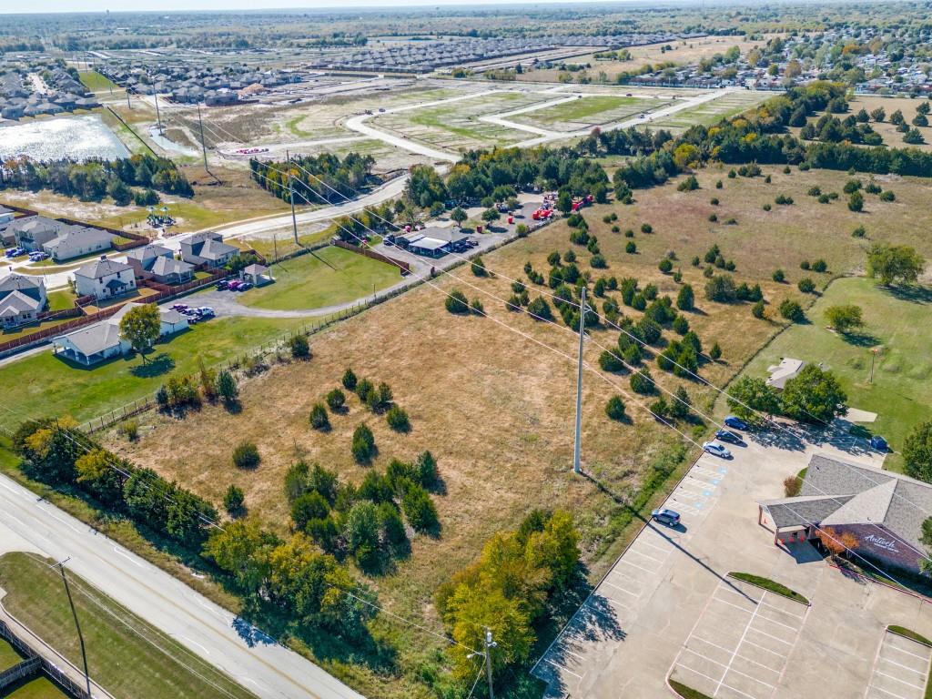 Prime acreage located in beautiful neighborhood right off I20 and Lawson Rd in Mesquite. Mesquite ISD. New homes being built in neighborhood. 3.96 acres ready to build your dream home or develop with multiple houses. Sale includes two parcels of land.
