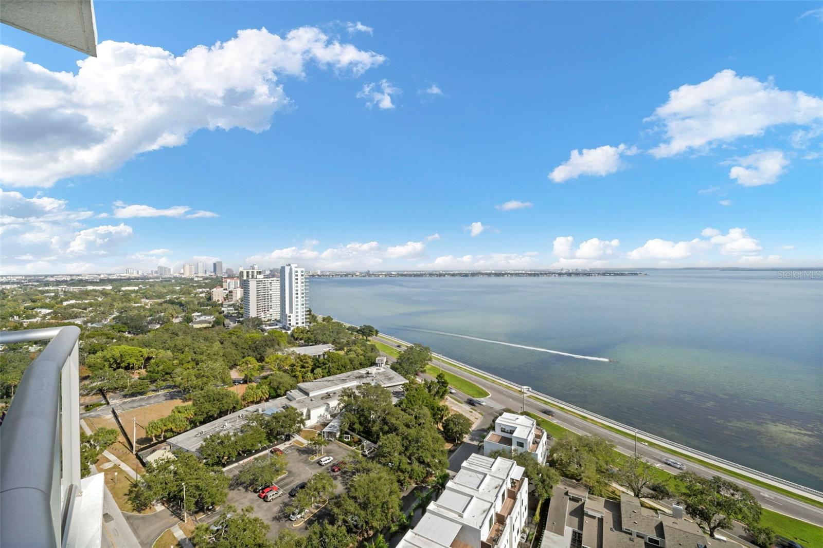 Welcome to elevated living at Altura Bayshore, one of Tampa’s newest and most prestigious luxury high-rise residences. Ideally positioned just moments from world-famous Bayshore Boulevard and the city’s premier shopping and dining destinations, this exquisite residence offers a refined blend of modern elegance, comfort, and breathtaking waterfront views.Unit #1902 showcases a thoughtfully designed interior characterized by wide-plank wood flooring, custom built-in closets, and floor-to-ceiling windows and sliding glass doors that flood the home with natural light while framing outstanding water views. Step onto your private balcony to enjoy sweeping vistas and unforgettable sunrises and sunsets over Tampa Bay.The chef’s kitchen is a true showpiece, featuring sleek cabinetry, premium appliances, an integrated wine refrigerator, and elegant finishes ideal for both everyday living and upscale entertaining. The open-concept layout seamlessly connects the kitchen, dining, and living spaces, creating an inviting atmosphere that is both sophisticated and functional.Altura Bayshore delivers a resort-style lifestyle with an exceptional suite of amenities, including 24/7 security, a rooftop pool with expansive outdoor entertaining spaces, pickleball and basketball courts, and a state-of-the-art fitness center. Every detail has been curated to meet the expectations of the most discerning buyer.This is luxury urban living at its finest — where panoramic water views, refined interiors, and an unparalleled South Tampa location come together in one extraordinary residence.
