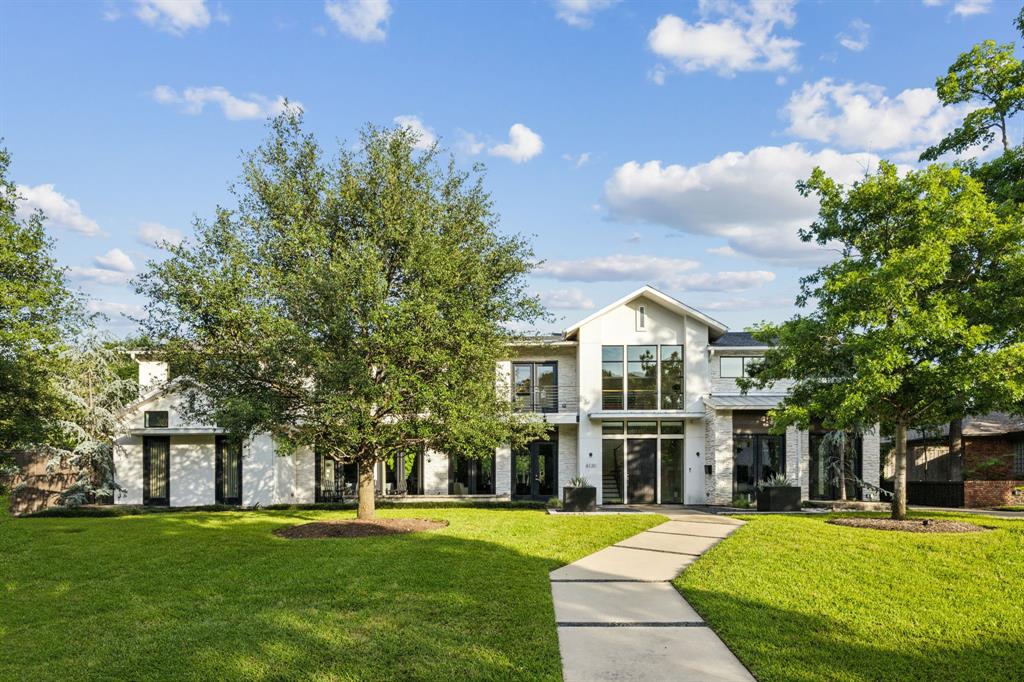 On over half an acre in Preston Hollow, this Green Built smart custom home blends luxury, efficiency, and style with a floor plan designed for functional living. The living area flows seamlessly into the kitchen, which features an expansive island, butler’s pantry, and a glass-enclosed, climate-controlled wine room. The first level also includes a private office, media room, and spacious primary suite. Upstairs, you'll find three en-suite bedrooms, a large playroom, gym, craft room, walk-in attic, and additional space ready to finish as a fifth bedroom. The main living areas feature oversized windows that flood the home with natural light and offer seamless access to the backyard, complete with a pool and spa, spacious covered patio, and beautifully landscaped grounds - perfect for entertaining. Additional amenities include full smart home integration, reverse osmosis water filtration system, built-in storm shelter, and a three-car garage. Enjoy a prime location, custom details throughout, and a truly special place to call home.