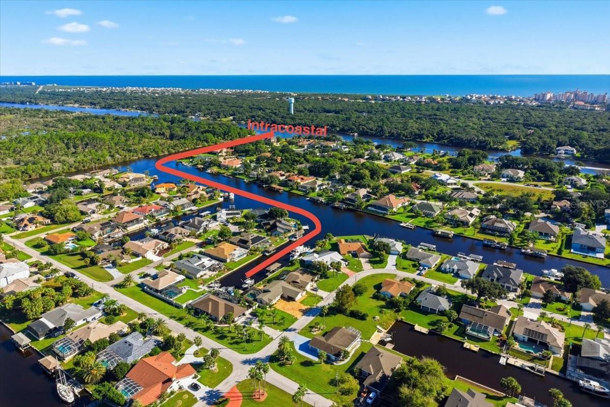 WHAT A VALUE IN SAILBOAT COUNTRY! Imagine mornings spent sipping coffee by the canal, your boat waiting at your private dock, and nothing on the agenda but sunshine, salt air, and a day on the water. Just minutes from the Intracoastal Waterway, this beautifully renovated, meticulously maintained 3-bedroom, 2-bath waterfront pool home offers 2,134 square feet of inviting living space and the Florida lifestyle you have been dreaming about—with NO HOA!Head out for a morning of fishing, cruise the waterways, and return home to your own waterfront retreat. Secure your boat on the 12,000-pound boat lift, then take a refreshing dip in the sparkling blue screened-in pool. Stretch out on a lounge chair and let the afternoon slip away! With generous pool decking and extensive brick pavers throughout the backyard, there is plenty of space for sunbathing, outdoor dining, and gathering with friends. Picture dinner sizzling on the grill, cold drinks in hand, and stories about the day’s catch as the sun begins to set. This is where everyday life feels like a Florida vacation!Set along a deep-water saltwater canal, your brand-new private dock features 50-amp power, a water hookup, and more than 30 feet of decking. Whether your perfect day involves fishing, exploring the Intracoastal, or a sunset cruise, adventure begins right in your backyard.Inside, the kitchen is the heart of the home—and what a beautiful place to gather! Beautiful custom granite countertops and a large center island create an inviting setting for preparing meals, sharing appetizers, and catching up with friends. Newer stainless-steel appliances and a stylish tile backsplash complete the space, while the open layout flows directly into the family room overlooking the water. You can be part of every conversation while enjoying the peaceful canal views!With multiple living and dining areas and abundant entertaining space throughout, this home offers room for everything from lively celebrations to quiet evenings at home. Walls of windows welcome natural light, and a separate office provides a convenient space for working from home. The thoughtfully designed split floor plan offers privacy, generously sized bedrooms give everyone room to settle in, and tile flooring runs throughout the entire home—no carpet! Both bathrooms have been updated, adding to the home’s move-in-ready appeal.At the end of the day, retreat to your spacious primary suite, where sliding glass doors open directly to the pool. Two walk-in closets and a beautifully updated bath with an expansive walk-in shower complete your personal escape.And when everyone wants to come over, you will be ready! The impressive brick-paver driveway accommodates approximately 12 cars, with extensive pavers continuing into the backyard for a beautifully finished setting from front to back. A whole-house Generac generator provides added peace of mind, while a 2019 AC system, 2018 roof, and side-entry two-car garage add comfort and convenience. The commercial-grade ice maker makes filling your cooler for a day on the water a breeze—just grab your fishing rods and go!Beautifully maintained and ready to enjoy, with beaches, shopping, dining, and I-95 conveniently nearby, this home brings together space, comfort, and exceptional waterfront living. The owner will also consider selling furnishings, making your next chapter even easier.Bring your boat, your fishing rods, and your favorite people. Your salt-life story starts here!