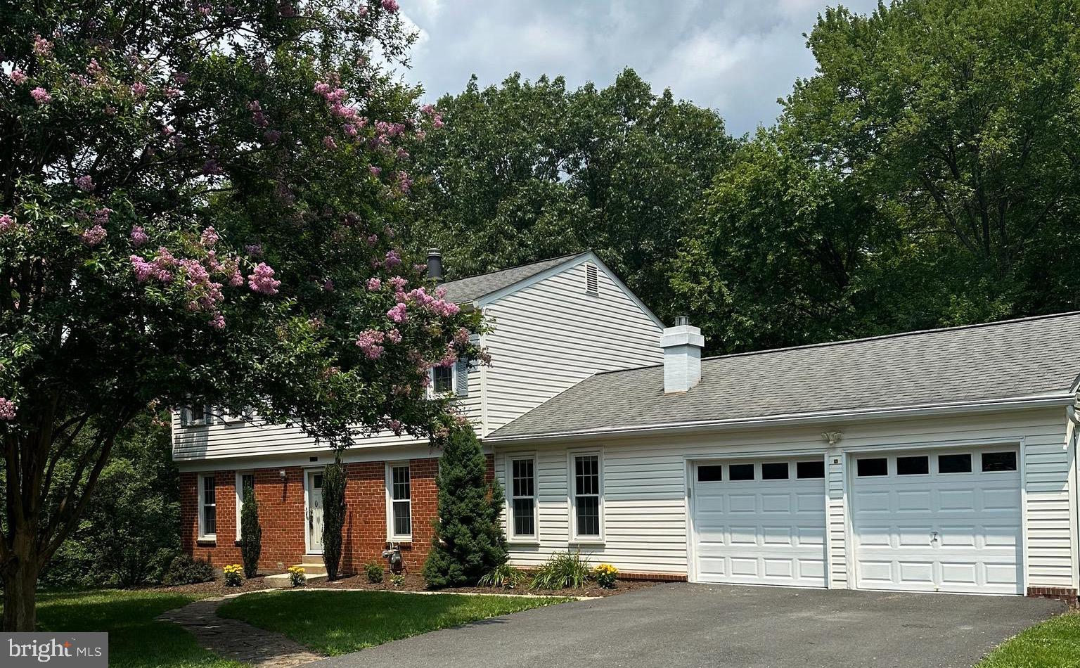 Welcome to this sun-filled home nestled on a quiet cul-de-sac in the desirable Stratton Woods community. Situated on a private half-acre lot, this beautifully maintained home features hardwood floors throughout the main and upper levels, a spacious kitchen, and inviting living and family rooms with a cozy gas fireplace. The upper level offers a generous primary suite with a private bath, plus three additional bedrooms and a full bath. The fully finished walkout basement with brand-new carpet provides flexible living space, including a den and room for a home office, gym, recreation room, or media room. Enjoy outdoor living on the expansive deck and patio overlooking the large, private backyard—perfect for entertaining or relaxing. Additional features include a two-car garage. Ideally located just minutes from Reston Town Center, Metro, shopping, dining, parks, and major commuter routes. Stratton Woods offers exceptional community amenities, including a scenic 10-acre pond, miles of walking trails, and a large playground. Don't miss this wonderful opportunity to own a home in one of Reston's most sought-after neighborhoods!