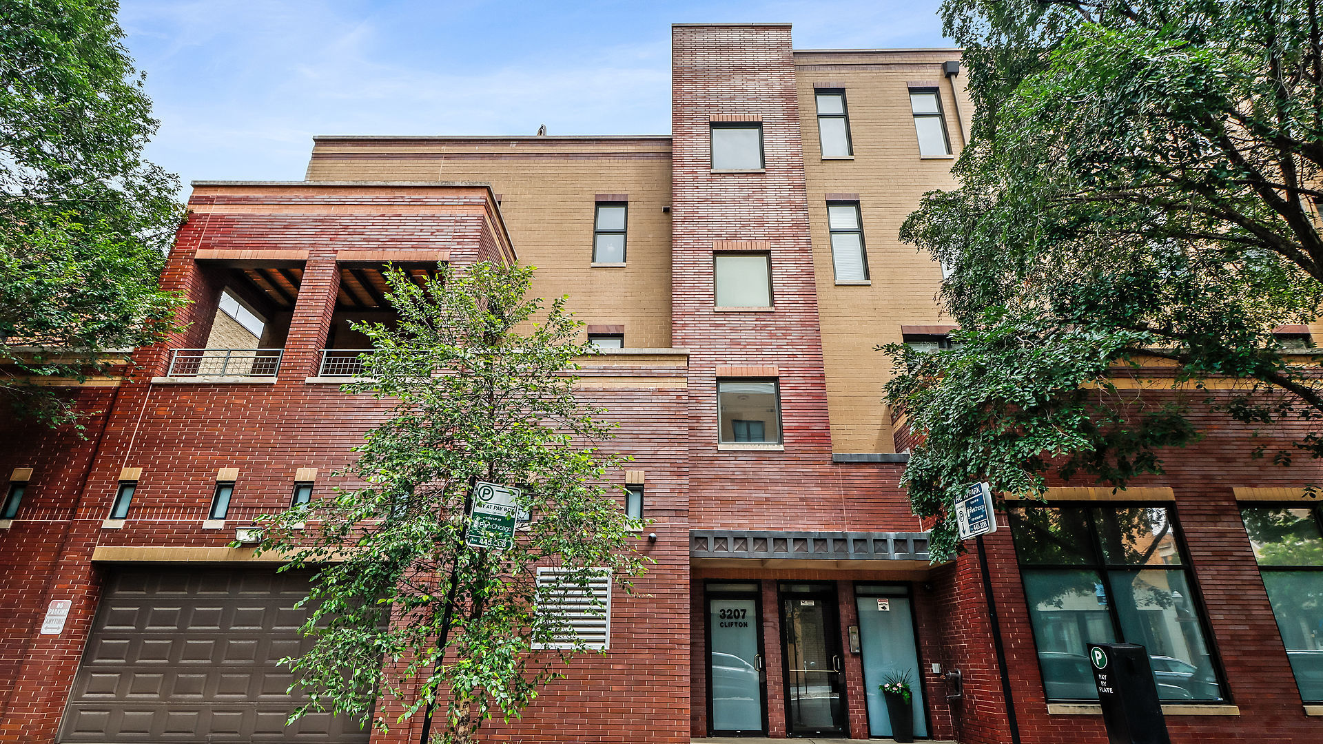 Prime Lakeview Location! Discover this sun-drenched 2-bed, 2-bath southwest corner penthouse in a boutique elevator building, perfectly located steps from the Southport Corridor and the "EL"! An entertainer's dream, this home features a truly unique open floor plan with soaring 10-foot ceilings, extensive crown molding, and wood floors. The gourmet chef's kitchen boasts a high end appliance package, custom cabinetry, an expansive granite peninsula & full pantry. The space flows seamlessly to a massive private terrace perfect for dining and relaxing. This wide unit boasts large room sizes with tons of storage and closets. Retreat to the primary suite with its spa-like marble bath. Incredibly solid construction with brick exterior and flexicore concrete between each floor provide exceptional soundproofing, plus share only 1 wall with 1 neighboring unit for added peace of mind!  Enjoy the convenience of an attached heated garage with direct street access off Clifton-no alleys. Well run association with over $31K in reserves, plus incredibly low HOA fees, this is city living at its finest.