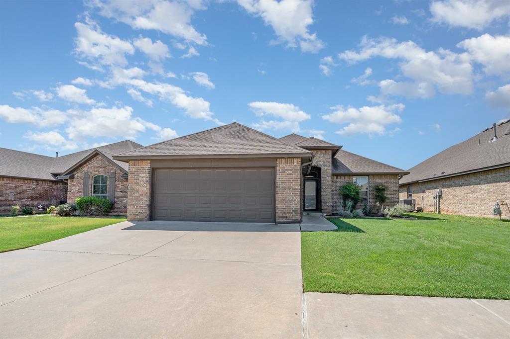 Excellent floor plan with open kitchen, living & dining. New carpet. Kitchen has granite countertops, large island, walk-in pantry. Good size living with Fireplace.  Pocket office off the entry. Primary suite & bath has marble vanities, double sinks, garden tub, separate shower and walk-in closet. Large utility. Covered patio, landscaped w sprinkler system. 3 car tandem garage for extra storage.