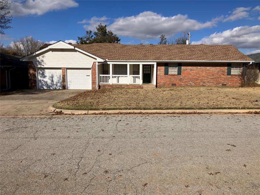 Located just south of Lake Hefner's amenities, parks and trail system.  This classic home features 3 beds, 2 baths & a toilet in utility room,  formal living and den with woodburning fireplace. Beautiful wood floors in den. Woodwork in great condition. Entry with coat closet. Hallway to bedrooms features a large closet, built in desk, and cabinets. This hallway is just to the right of entry and has a door that can close allowing privacy for all bedrooms. Master bedroom with walk-in closet and shower.  Bedroom 2 has 2 closets with lights. Kitchen with built in hutch, breakfast bar and plenty of room for dining room table plus a bay window. Oversized utility room with a private toilet (no sink). 2 car garage with door to backyard. Interior cosmetic updates needed, house priced accordingly. Exterior is well maintained and features sidewalk areas for easy gardening. The crawl vents auto open and close based on temp. Easy to care for vinyl siding. Covered porch is charming, but the back patio is a must see (brick flooring). Buyer to verify school assignment.