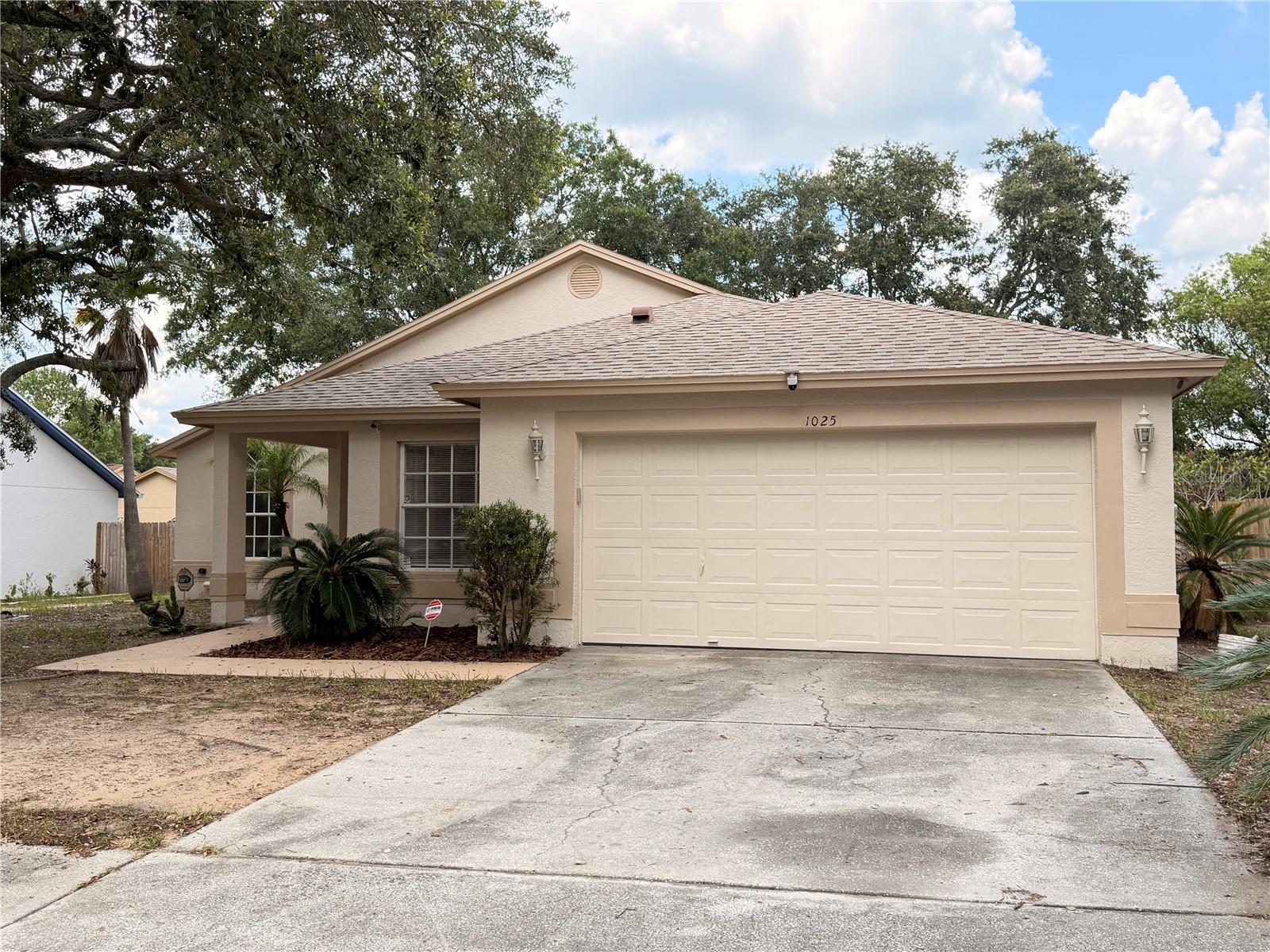 NO HOA OR CDD FEES! MOVE-IN READY AND FULL OF POTENTIAL!Welcome to this charming 3-bedroom, 2-bathroom, 2-car garage home nestled in an established neighborhood with no HOA or CDD fees. Freshly painted interior and exterior, this move-in-ready residence provides the perfect opportunity to add your personal style and make it truly your own.The inviting open-concept living and dining areas flow seamlessly into a functional galley kitchen featuring a cozy breakfast nook—ideal for everyday living and casual entertaining. A thoughtfully designed split-bedroom floor plan offers both privacy and maximum functionality, ensuring every square foot is well utilized. Kitchen has brand new stainless steel refrigerator, a new range to cook those secret family recipes. Property has brand new flooring throughout.Large windows and a sliding glass door fill the home with natural light while creating a seamless connection to the outdoor living spaces. Enjoy Florida living year-round from the screened lanai or relax on the open-air patio overlooking the fully fenced backyard—perfect for entertaining, pets, play, or creating lasting memories with family and friends.Conveniently located with quick access to I-75 and I-4, this home offers an easy commute while maintaining the charm and tranquility of a well-established community.Whether you're a first-time homebuyer, downsizing, or looking for an investment opportunity, this home is ready for its next chapter.Welcome Home!