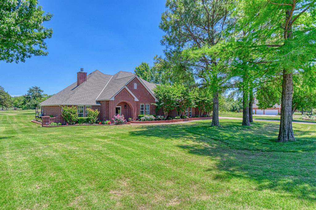 SELLERS ARE WILLING TO NEGOTIATE! Nestled on 2 beautiful acres overlooking the prestigious Cobblestone Creek Golf Course, is an elegant home which offers serene luxury living with stunning fairway views. This layout has an open and functional floor plan which includes, 2 living areas, 2 dining areas, 3 spacious bedrooms, 2 full bathrooms, study and laundry room which include washer and dryer with lots of storage space.
Interior highlights include rich wood flooring, tile in the bathrooms and plush carpet in the bedrooms. The kitchen features a new 5 gas burner top with convection bake and self-cleaning stove, built-in trash compactor, built-in ice maker and countertop breakfast bar.  Large windows flood the home with natural light while offering uninterrupted golf course views. The main living area and master bedroom each feature a cozy gas fireplace, perfect for relaxing evenings.
The beautiful kitchen flows seamlessly into the dining and living area, ideal for entertaining. The master suite includes a walk-in closet, an additional closet, and a bathroom with his and her sinks and a large separate shower with a built-in sitting area. Additional features include surround sound system, ceiling fans and custom built-in cabinetry throughout the home. 
Outside, the back patio is ideal for relaxing and entertaining while using a gas brick firepit. The property also includes a four-car attached and detached garage layout. The attached oversized two-car garage connects to the side of the home. The attached garage includes a spacious workshop with overhead lighting and lots of workspace. The detached two-car garage is designed with a matching fa&#231;ade to maintain architectural consistency.
Residents enjoy exclusive HOA amenities, including unlimited golf course access, with a personal golf cart, pool, and a clubhouse ensuring a resort-style lifestyle right at home. This exceptional home is ready to welcome you.