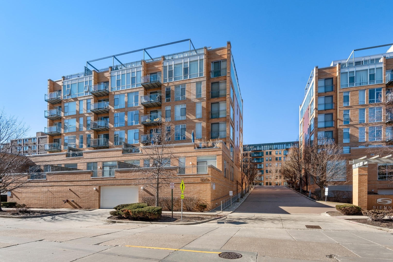 EXPERIENCE UNPARALLELED LUXURY IN THIS CUSTOM-DESIGNED PENTHOUSE SPANNING APPROXIMATELY 2,200 SQ FT, THIS 3-BEDROOM, 2.5-BATHROOM RESIDENCE BOASTS FLOOR-TO-CEILING WINDOWS THAT FLOOD THE SPACE WITH NATURAL LIGHT AND OFFER SWEEPING CITY  VIEWS. THE NEARLY 1,600 SQ FT WRAPAROUND TERRACE FEATURES AN INTEGRATED IRRIGATION SYSTEM, PROVIDING A PRIVATE OASIS FOR OUTDOOR LIVING AND ENTERTAINING. THE CHEF'S KITCHEN IS A CULINARY DREAM, FEATURING A POLIFORM DESIGN EQUIPPED WITH TOP-OF-THE-LINE APPLIANCES: A BUILT-IN SUB-ZERO REFRIGERATOR, WOLF RANGE, DOUBLE OVEN, TWO MIELE DISHWASHERS, AND A WINE COOLER. THE PRIMARY SUITE OFFERS A SPA-LIKE EXPERIENCE WITH A LIMESTONE-CLAD STEAM SHOWER, DUAL RAIN SHOWER HEADS, AND CUSTOM CLOSET AND STORAGE. ADDITIONAL HIGHLIGHTS INCLUDE BRAZILIAN WALNUT HARDWOOD FLOORS, AMX SMART HOME CONTROLS FOR LIGHTING AND BLINDS, AND A BUILT-IN PROJECTOR AND SCREEN FOR HOME THEATER ENJOYMENT. THIS END-UNIT PENTHOUSE ALSO INCLUDES TWO HEATED GARAGE PARKING SPACES AND TWO STORAGE LOCKERS CONVENIENTLY LOCATED ON THE SAME FLOOR. LOCATED IN THE HEART OF DOWNTOWN EVANSTON, RESIDENTS ENJOY EASY ACCESS TO DINING, SHOPPING, AND PUBLIC TRANSPORTATION.