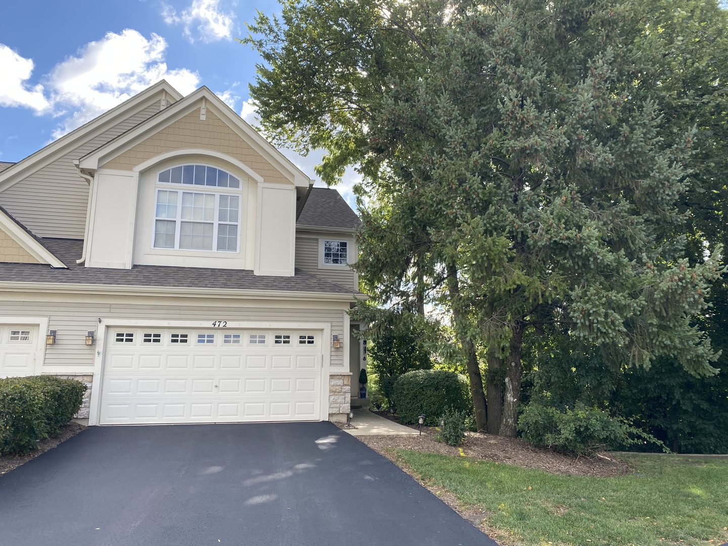 Welcome to the highly sought after, maintenance-free townhome community of Woodland Lakes! This West facing, end unit home is located in highly rated Naperville school district 204 (Metea Valley HS). Upstairs you will find the primary bedroom with an attached bath. The 2nd bedroom has direct access to the hall bath. The large loft that can be converted into a 3rd bedroom or kept as an office. The primary bedroom features an attached bathroom and a walk-in closet. The powder room & laundry room are conveniently located on the first floor. The full/partially finished "lookout" basement is equipped with rough in plumbing for a future bathroom. Items in the home that have been replaced include:furnace & air conditioner (2023), water heater (aprox. 2-3 yrs. old), dishwasher (aprox. 3.5 yrs. old), roof and gutters (2021), driveway (2024)-both replaced by the homeowner's association. Located only minutes from the local library, fitness centers, restaurants, transportation, Fox Valley Mall, downtown Aurora & the Rte. 59 Metra station. It's time to call 472 Vaughn Circle YOUR home! Woodland Lakes is investor approved and pet approved.