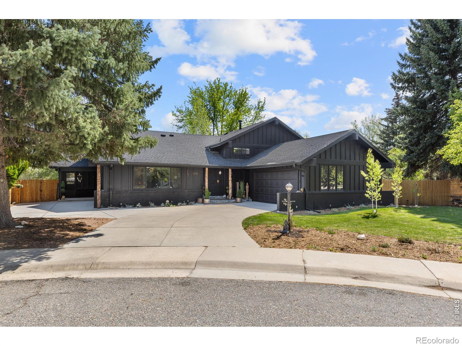 Tucked away on a quiet cul-de-sac in desirable Gunbarrel, 6976 Green Willow Ct blends thoughtful updates with inviting indoor-outdoor living on a spacious, tree-lined lot offering privacy just minutes from Boulder's top amenities.The home makes a strong first impression with a freshly painted exterior and a redesigned entry. Inside, natural light fills the open-concept layout, highlighted by vaulted ceilings and warm hardwood flooring throughout the main level. The kitchen has been refreshed with new granite countertops and updated lighting, creating a stylish and functional centerpiece. The dining area features a new statement chandelier, adding a touch of modern elegance. Multiple living spaces provide flexibility, including a spacious lower-level family room with a cozy fireplace and wet bar, perfect for entertaining.Upstairs, all four bedrooms offer comfort and updates. A standout feature is the garden room but this flex space is just waiting for the imagination of the next owner. Will it be a bike shop, art studio, office, or kids play house? The backyard is a true oasis, featuring a small orchard with peach, apple, and plum trees, along with raspberries, gooseberries, blueberries, and goji berries.Move-in ready and ideally located near Boulder Country Club, trails, and local favorites-this is a rare Gunbarrel opportunity.