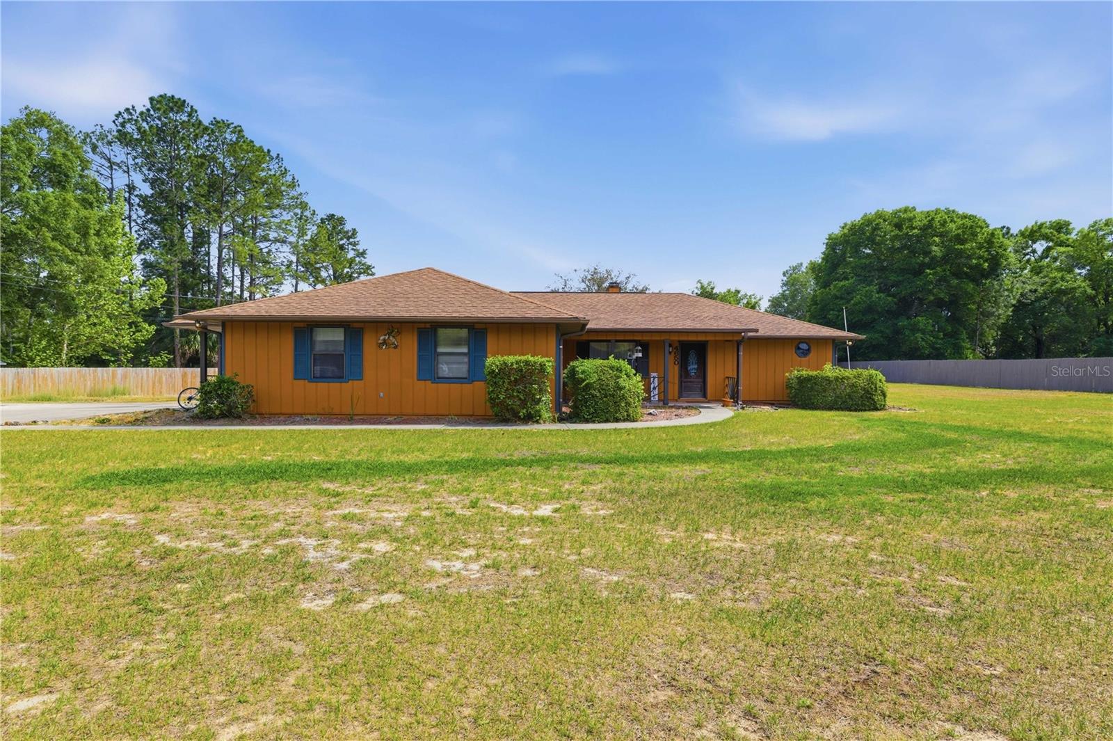 Welcome to this truly rare find in one of the most desirable areas of Ocala, FL, just minutes from the World Equestrian Center! Nestled on over an acre of beautifully sized property, this charming and character-filled 3-bedroom, 2.5-bath home offers the perfect blend of space, warmth, and versatility. Step inside and discover an oversized, inviting living room that is perfect for entertaining guests or relaxing in comfort. The home also features a separate cozy family room, offering additional space for gatherings, movie nights, or quiet evenings at home. A beautiful wood-burning fireplace adds warmth and timeless charm, creating a welcoming focal point in the living space. The spacious layout continues with a versatile bonus room that could easily be used as a mother-in-law suite, guest retreat, home office, or private flex space. Each room offers its own unique appeal, with generous proportions, comfortable flow, and endless potential to make it your own. This home is full of personality, charm, and opportunity—all in a highly sought-after location close to shopping, dining, and equestrian events. Don’t miss your chance to own this one-of-a-kind Ocala property!