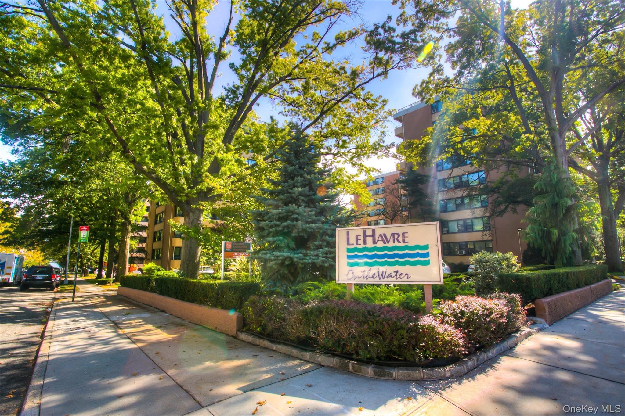 Beautiful, large 1 bedroom apartment. Central air conditioning.  Renovated kitchen and bathroom.  Stainless steel appliances and granite countertops.  New wood floors. Crown molding and custom lighting.  Custom blinds.   Bridgeview.  Extra large terrace for beautiful outdoor space. Le Havre offers 2 outdoor swimming pools. 3 tennis courts, gym and clubhouse with cafe. Enjoy the beautiful greenery with outdoor parks and playgrounds.  Prime parking spot in front of building.  $10,000 transfer fee plus monthly charge of $60.  Monthly assessment $113.63. Easy access to NYC Express bus and local bus to Flushing/#7 train. Close vicinity to highways and bridges.