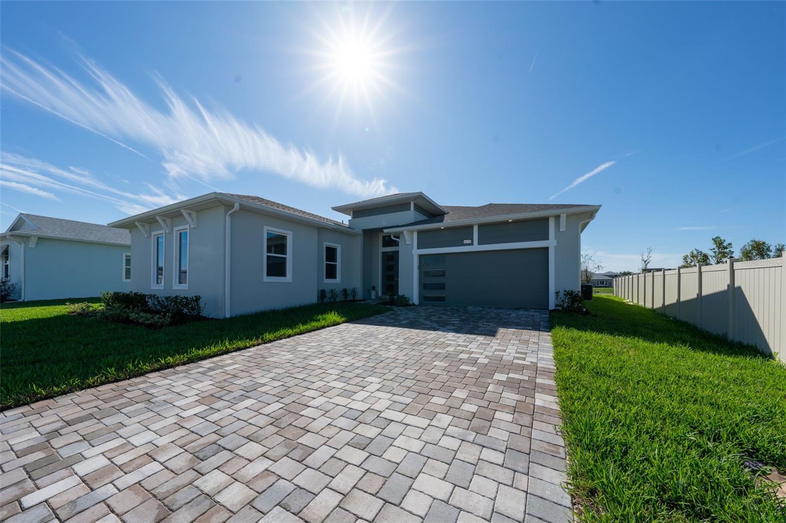 Experience elevated living in the highly sought-after community of Robins Cove at Epperson Ranch.
Built in 2022 by luxury builder Biscayne Homes, this stunning modern residence combines elegant design, functional living, and resort-style amenities in one of Wesley Chapel’s most desirable neighborhoods.

Featuring 3 bedrooms, 2.5 baths, and a spacious den/flex room that can easily serve as a fourth bedroom, this home offers the perfect balance of open-concept living and private retreat. As you enter, you’re welcomed by a bright, airy living space with sliding glass doors that open to your screened-in patio, sparkling pool and spa, and serene pond views perfect for Florida indoor-outdoor living.

The gourmet kitchen is a showstopper, boasting an oversized quartz island, designer finishes, a gas cooktop, and a butler’s pantry connecting to the large walk-in pantry. Whether you’re hosting a dinner party or enjoying a quiet breakfast, you’ll appreciate the seamless flow between the kitchen, dining area, and outdoor space.

The primary suite offers a peaceful escape with an oversized shower, and walk-in closet. A true split floor plan ensures privacy for guests or family in the additional bedrooms and baths.

Located near Tampa Premium Outlets, Wiregrass Mall, and The Grove, this home offers both luxury and convenience. Easy access to I-75 makes commuting a breeze.

Living in Epperson Ranch means more than just a beautiful home it’s a lifestyle. Enjoy the famous 7-acre Crystal Lagoon, complete with sandy beaches, water slides, a lazy river, outdoor movies, dog parks, and fitness trails for endless recreation right in your community. *Photos are from a previous listing when property was professionally staged. Fixtures, finishes, and interior details remain the same; however, the home is currently tenant-occupied and furnished by tenant