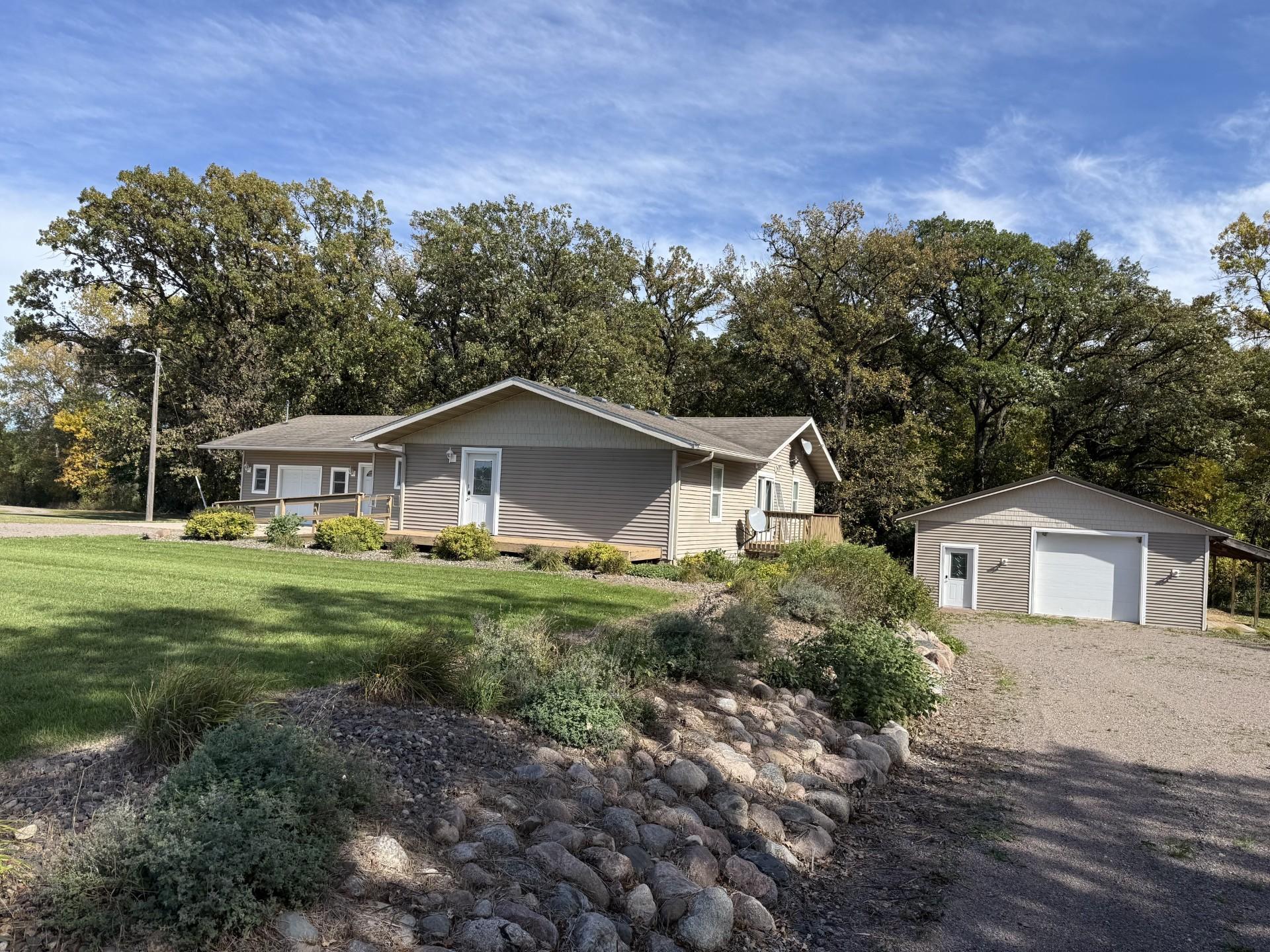 Welcome to a very private 3 acres located on the edge of the City of St. Joseph.  This is a spacious walk-out rambler with a large heated pole shed. (28' x 46')  This is a unique property with lots of potential uses.  The seller previously used the main level as a salon and photography studio.  The main level has a commercial finish remaining with reception area, changing rooms, and salon area.  This could be converted back to single-family living.  The lower level has a single family living space with 2 bedrooms, 1-bathroom, kitchen and living areas.  This spacious rambler could be used for an in-home business with living quarters in the basement, converted back to full living quarters on both levels or a combination of both.   This might be a nice remodel investment property for the right buyer. The city currently has this property zoned for residential use.  The driveway comes directly off of County Road 75.  Property consists of two 2 parcels.  1 - 3.0 acre, 1 - .37 acre.