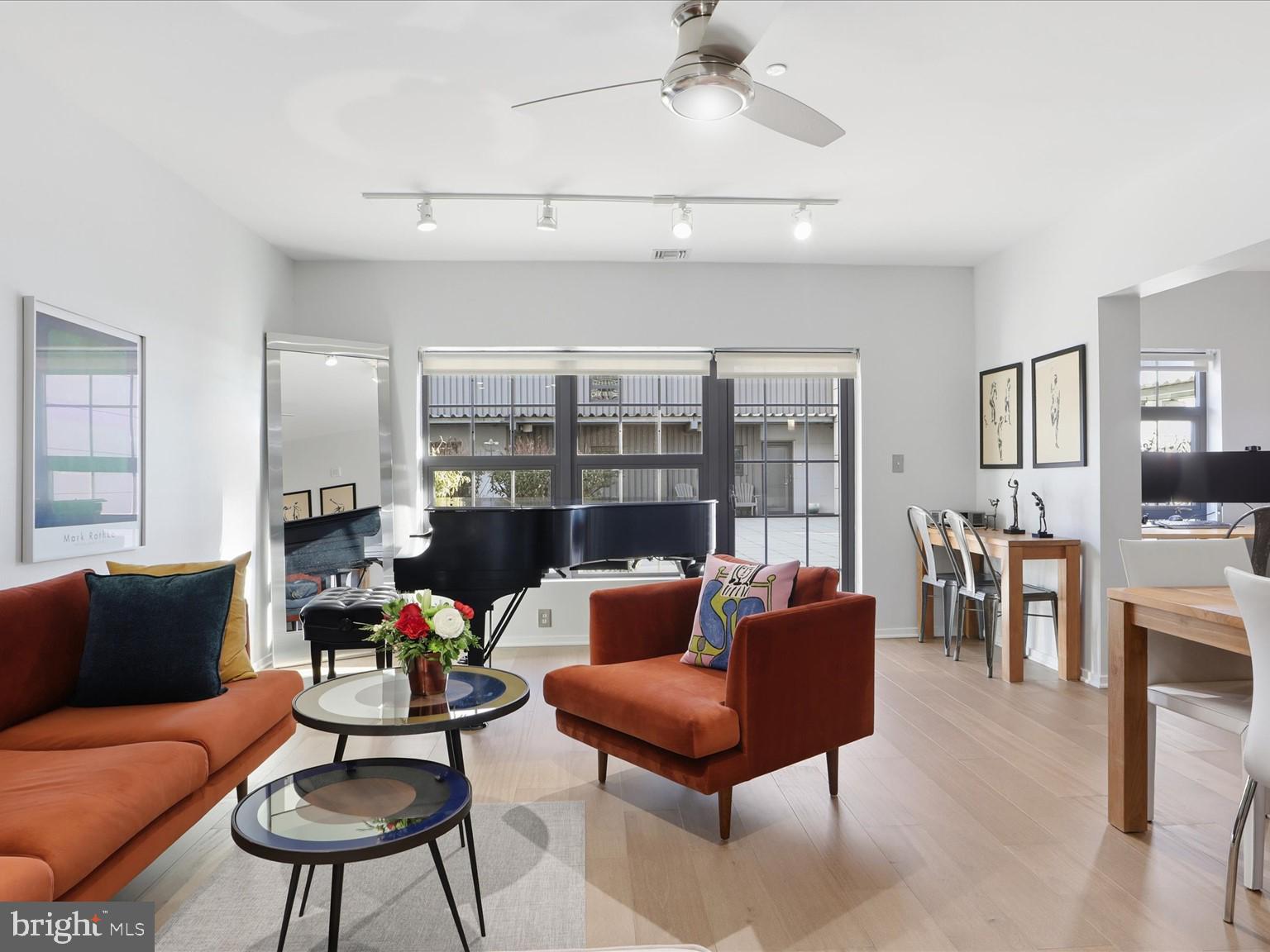 Experience the best of elevated urban living in this beautifully maintained Skytown at Silo Point, a townhome style residence designed for those who want generous space, modern style, and effortless living, all wrapped in a luxury high rise experience.This corner Skytown spans three thoughtfully designed levels, each filled with natural light and enhanced by sweeping views from the third level balcony, located on the same level as the private primary suite with attached ensuite bath. The primary bath has been beautifully renovated, creating a fresh and modern retreat. Storage throughout the home has been thoughtfully customized with Closet Innovations, including all storage shelving and walk in closet spaces, offering exceptional organization.The second level offers incredible flexibility with a large Bonus Room, currently being used as a Den, a secondary ensuite bedroom, and a dedicated laundry room with an oversized connected storage room, also outfitted with custom Closet Innovations systems. A custom stairway railing on the second floor adds a distinctive architectural touch and elevates the overall design.Beautiful Brazilian Ash flooring by Triangulo flows throughout the home, complemented by fresh paint that gives every room a clean and modern feel. Nearly every space has been thoughtfully updated or renovated, and both bedrooms feature newly installed windows, adding comfort and efficiency.Buyers who crave the space of a townhome but none of the exterior maintenance will love the effortless lifestyle here. Being part of Silo Point means enjoying a full suite of premium amenities, including twenty four hour front desk service, a state of the art fitness center, community lounges, and more.As an added benefit, the seller is offering five thousand dollars in seller help with an acceptable offer, which may be used toward new appliances of your choice or applied otherwise.A rare Skytown offering with exceptional upgrades, outstanding storage, a renovated primary bath, new bedroom windows, and access to world class amenities. This is the low maintenance luxury lifestyle you have been waiting for. Do not miss it.