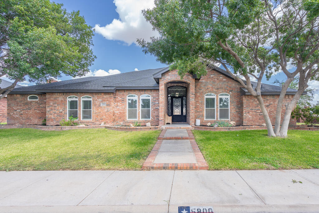 Beautifully updated 5 bedroom, 4 baths & 1 half bath in Grassland Estates!  Designed for family life and entertaining, this home blends timeless elegance with warm, livable spaces. Crown molding, plantation shutters, designer lighting and detailed ceilings create a sense of luxury throughout. The impressive kitchen features an oversized island, custom cabinetry, granite countertops and double ovens. A spacious built-in living area is perfect for movie nights, homework or gathering together. This is more than a home—it's the elevated lifestyle your family has been waiting for!