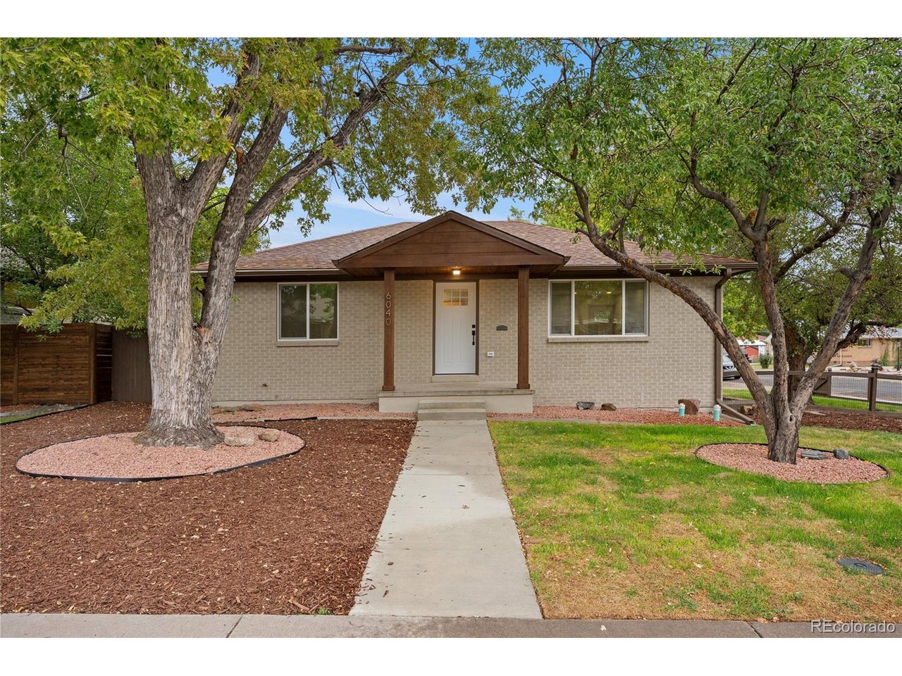 Welcome to a truly special home in one of Arvada's highly sought-after neighborhoods! Sitting on a large corner lot, this move-in-ready property combines thoughtful updates, one-of-a-kind finishes, and the space and functionality Colorado buyers are looking for.Step inside and you'll immediately appreciate the attention to detail throughout the home. The kitchen is a standout, featuring beautiful finishes and an oversized island that creates the perfect gathering space for everyday living, entertaining, or enjoying a morning coffee. The home offers a comfortable, functional layout with plenty of space to make it your own.One of the biggest highlights is the oversized two-car garage - a rare find for buyers who need more than just a place to park. Whether you're a car enthusiast, weekend mechanic, hobbyist, or simply need a dedicated workshop and extra storage, this garage gives you the flexibility to actually use your space the way you want.Outside, the large corner lot provides additional breathing room and a great setting for outdoor entertaining, pets, gardening, or simply enjoying Colorado's beautiful seasons.And the location is hard to beat. You're surrounded by the best of Arvada, with nearby parks, trails, Lake Arbor recreation, shopping, restaurants and convenient access to major roadways. Lake Arbor offers opportunities for walking, fishing, paddleboarding, canoeing and enjoying the outdoors, while Olde Town Arvada provides an excellent mix of dining, coffee, shopping and entertainment.For the outdoor enthusiast, the location also puts you within easy reach of the mountains and ski country, with Loveland Ski Area approximately 45-50 miles away depending on the route and traffic. Downtown Denver is roughly 12-15 miles away, making it easy to enjoy the city while still coming home to a quieter Arvada neighborhood.