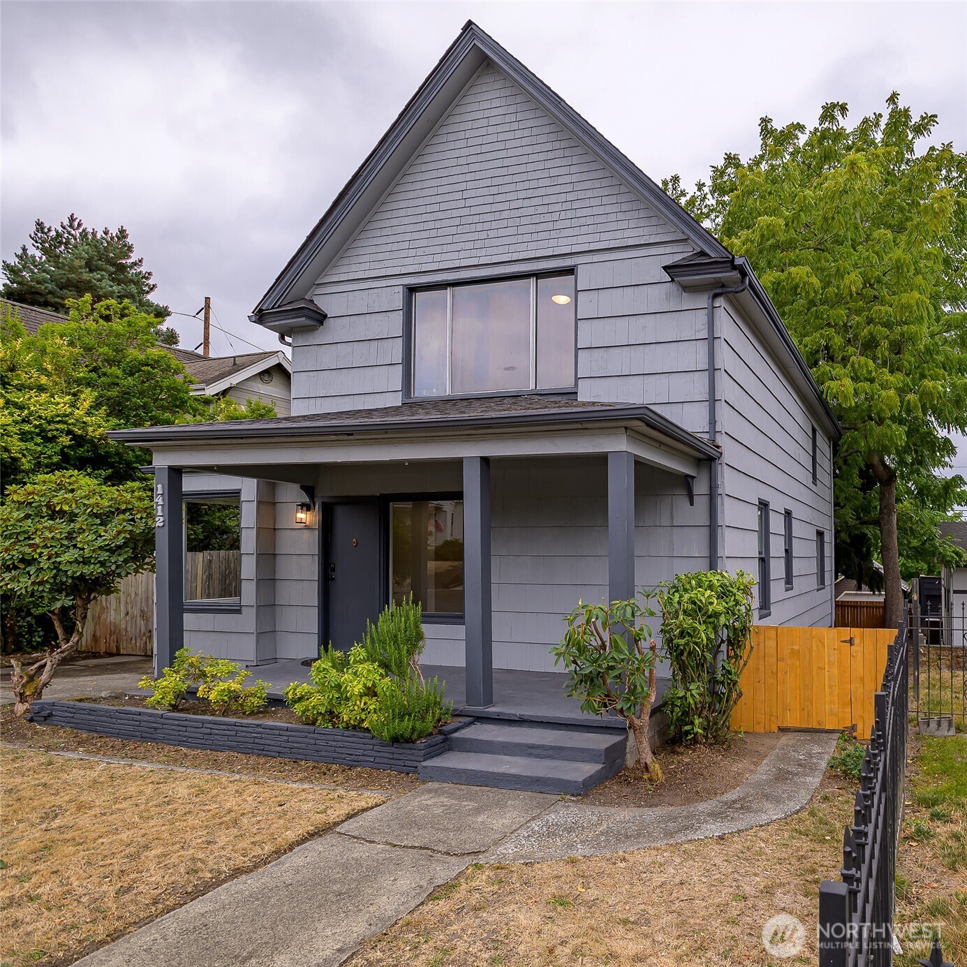 Welcome to beautifully remodeled North Tacoma living, where classic character meets fresh, modern style. This spacious 4-bedroom home has been thoughtfully updated and is ready for its next chapter. Step inside to discover generous room sizes, refreshed finishes, and a comfortable floor plan that meets today's lifestyle demands. Four bedrooms provide flexibility for guests, a home office, hobbies, or simply room to spread out, and there's more downstairs—a full unfinished basement offers tremendous additional space and possibilities for storage, a workshop, a fitness area, or future expansion. Outside, one of this home's standout features awaits: a large detached 2-car garage—a hard-to-find North Tacoma amenity with room for vehicles, gear, projects, and more. Set in Tacoma's desirable North End, you're close to neighborhood favorites. Within walking distance of the University of Puget Sound, parks, shopping, dining, and everything that makes North Tacoma such a sought-after place to call home. Fully Remodeled. Four bedrooms. Full basement. Large 2-car garage. A North Tacoma location. Come experience it in person—you may have just found the space you've been waiting for.