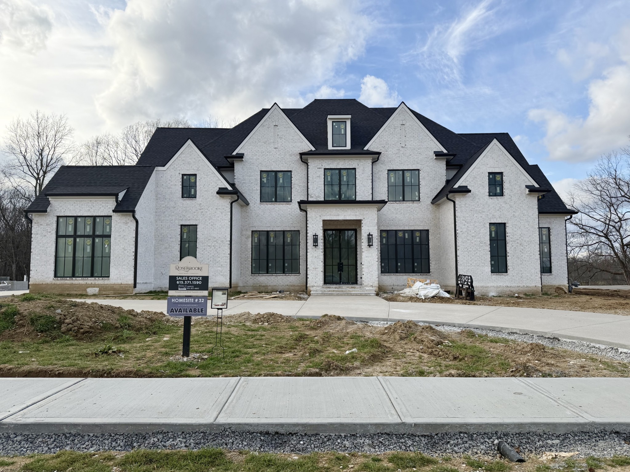 Discover the epitome of luxury living in this Schumacher Homes stunning 5-bedroom home, complete with 5 full and 2 half baths, a 4-car garage, and expansive 0.66 acres. Spanning 7,444 sq/ft, this residence features an elevator to both levels and soaring ceilings throughout. Enjoy elegant dining in the formal dining room with a large butler pantry, a climate-controlled wine cellar with custom racking, and a sophisticated study with a fireplace. The grand great room boasts vaulted ceilings and sliding doors that lead to a luxurious outdoor living space with a fireplace and grill station—perfect for entertaining.A dual-access prep kitchen complements the state-of-the-art primary kitchen, while the generous breakfast room offers easy access to the covered outdoor area. The oversized laundry room features abundant custom cabinetry, and the private primary retreat includes a vaulted ceiling, sitting area, and spa-like bath. A guest ensuite bedroom on the main level ensures comfort for visitors, and an exercise room off the garage provides convenient access. The second level features three exquisite ensuite bedrooms, a bonus room with a wet bar, and a second laundry room, making this home a true sanctuary for relaxation and entertainment. *CUSTOM POOL & SPA INCLUDED IN  PRICE !!!  This Estate is A MUST ON YOUR LIST of HOMES to TOUR!!!!