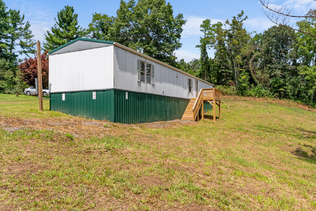 Move-in ready and packed with recent updates! This Woodlawn property features new LVP flooring throughout, new water lines, a new water heater, new septic system, updated fixtures, new porches, completed groundwork, and a durable metal roof. Enjoy a peaceful setting while being just a few miles from the New River, a public boat landing, and several New River Trail access points. Whether you enjoy fishing, kayaking, biking, or simply being close to the outdoors, this home offers a great combination of updates, location, and convenience.