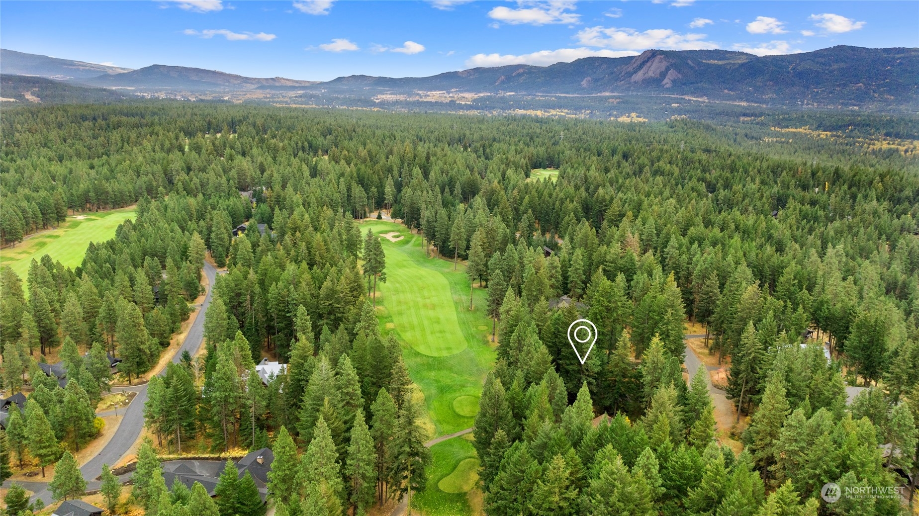 Home is located on the Tee box of Prospector Golf Course Hole #2