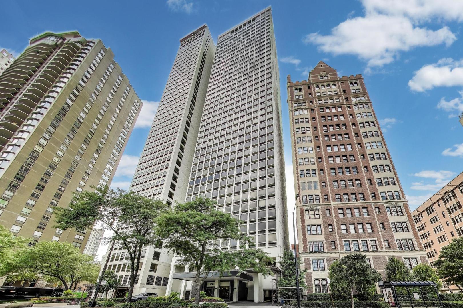 Stunning views of Oak Street Beach, Lake Michigan and the Lakefront Trail! Premier location for beach, shopping and dining. The epitome of all that's great about Chicago. This home truly has it all!! A gracious foyer leads to this impeccably updated home with Floor to ceiling windows that top the trees below. Real walnut stained hardwood throughout, designer lighting and updated baths. Large newer Chef's kitchen with quartz and high end appliances opens to the expansive living area.  Primary Bedroom features cove lighting, a large walk-in closet and a western view. The spa like Primary Bath features heated floors, large shower with multiple shower heads, and double sink. All 3 bedrooms have western views and hardwood floors. The 2 1/2 bathrooms have been updated with the hall bath featuring neutral tile and a rain shower head. Recently the current owner has added alabaster sills in the living room, new ac units in the bedrooms, hand crafted cabinetry in the office and freshly painted. There is an in-unit laundry, and multiple closets for storage space.  This building has exceptional security and amenities which include 24 hour doorman, valet parking in garage, pool, sundeck, exercise facilities, party room, storage unit, and on site management and engineer. HOA includes all the amenities PLUS water, parking, security, TV/Cable, exterior maintenance, lawn care, scavenger, snow removal, Wi-Fi, and Internet access. Gorgeous unit that is move in ready! Quality renovation with solid core doors and the best hardware!