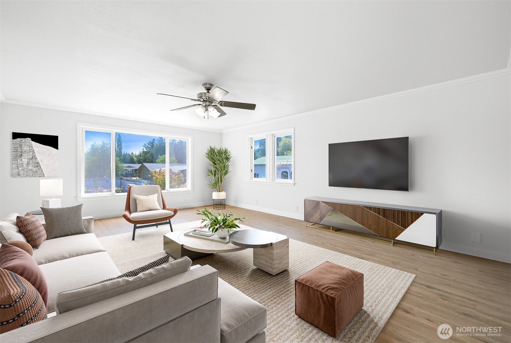 Bring Offers Motivated Sellers! Sellers are open to helping the right buyer put the finishing touches on this recently updated 1960 home featuring 5 bedrooms, 3 full baths, and two laundry areas across 2,875 sq. ft. of comfortable living space. Recent improvements include fresh interior paint, new upstairs flooring, and efficient forced-air heating, making the home move-in ready for everyday living. The flexible lower level is ideal for guests, extended living, or a home office. Outside, note the fully fenced backyard with hot-tub, space for pets and play, RV parking, and an attached garage. Situated on a 7,405 sq. ft. corner lot, just one mile from schools and parks, this home offers an exceptional blend of space, comfort, and convenience.