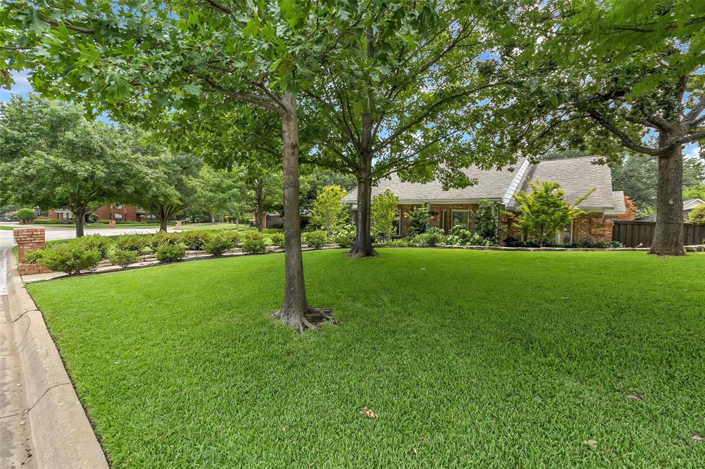 Welcome to your EXQUISITE Colleyville DREAM property! This beautifully updated ONE STORY, 4-bedroom home offers 3,072 sq. ft. of thoughtfully designed living space on a generous .39-acre lot. Nestled in a serene location with no rear neighbors, the home backs to a green space- with a walk out the back gate quickly allowing you to enjoy the trails, water park, pond & playgrounds of beautiful Chisholm park! Inside, you’ll be wowed by the attention to detail & quality in this home - including fresh paint & newly refinished wood floors (July 2025), a stunning back-lit fireplace, exotic wood living room cabinets (providing great storage or a place to hide the TV) & a fully remodeled primary bath with separate double shower—all adding both high-end finishes & comfort. A Class IV impact-resistant roof, gutters with guards, newer HVAC & water heaters, granite counters & stainless appliances are just a few of it's stand-out features. The layout is also sure to impress with all rooms being large in size with plenty of space to spread out or entertain guests.
Car enthusiasts & hobbyists will fall in love with the INCREDIBLE 5-car garage setup—an attached 3-car garage plus a separate over-sized 2-car garage & workshop combo. This space is complete with an extra 12’ work area, stairs to a floored attic (with finish-out potential), electricity, sink & a high-volume exhaust fan. The shop also features a wall-mounted AC & heater unit, making it the ultimate year-round workspace.
If all that isn't enough-- step out into your very own GORGEOUS backyard oasis, featuring a Pebble Tec pool, a custom over-sized stone & concrete patio and lush professional landscaping that enhances curb appeal. The yard also includes a greenhouse with electrical access & a charming chicken hutch for added lifestyle flexibility. 
Zoned for award-winning HEB schools (with the potential to attend Colleyville schools if desired)-- this amazing, one-of-a-kind home doesn't come along often-- Don't miss it!