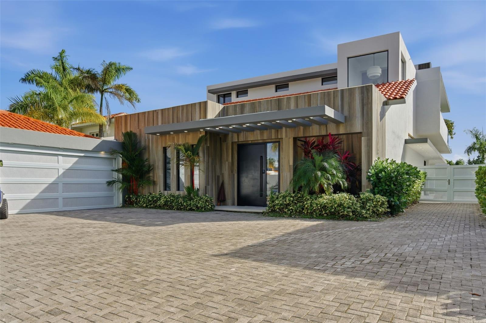 Discover refined modern living in this fully renovated Dorado Beach East residence, offering 6,625 sq ft. of beautifully reimagined interiors and exceptional outdoor spaces. Set on a 1,152 sq mt. lot, this two-story home features 6 bedrooms, 8 baths, and a seamless blend of high-quality construction with contemporary design. Completely redesigned the home showcases a modern chef’s kitchen, elegantly updated bathrooms, expansive living areas, and refined finishes throughout. Outdoors, enjoy resort-style living with a stunning pool and jacuzzi, multiple covered terraces, an open paved patio, exterior bath and shower, and lush surroundings ideal for entertaining. Additional features include a golf cart garage, generator, water cistern, and water heater. Located within the gated and highly coveted Dorado Beach East community, this turn-key property offers unparalleled comfort, privacy, and elevated Caribbean living.