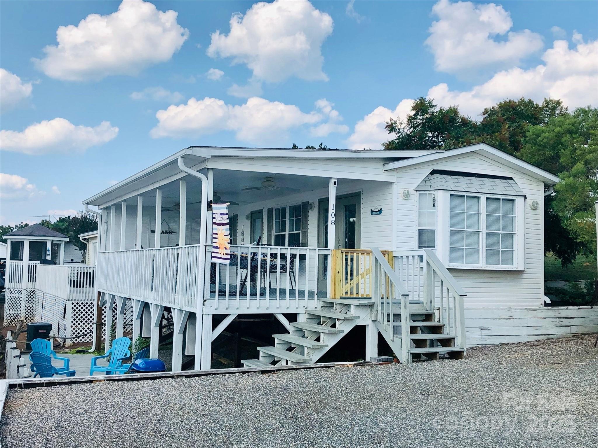 Come see what Badin Shores Resort is all about! Gorgeous lake views from your covered deck! Relax in the hammock underneath the outdoor fans. Soak up on the sun on your boat, at the sandy beach area or in the huge resort pool. The resort offers putt-putt, basketball, disc golf, pool, beach, fitness center, laundry room, fishing pier, boat ramp, on site restaurant and marina. The property is nicely remodeled and comes fully furnished and turnkey! New Lennox HVAC package unit installed May, 2024. All new PEX plumbing and full size water heater installed in 2023.
