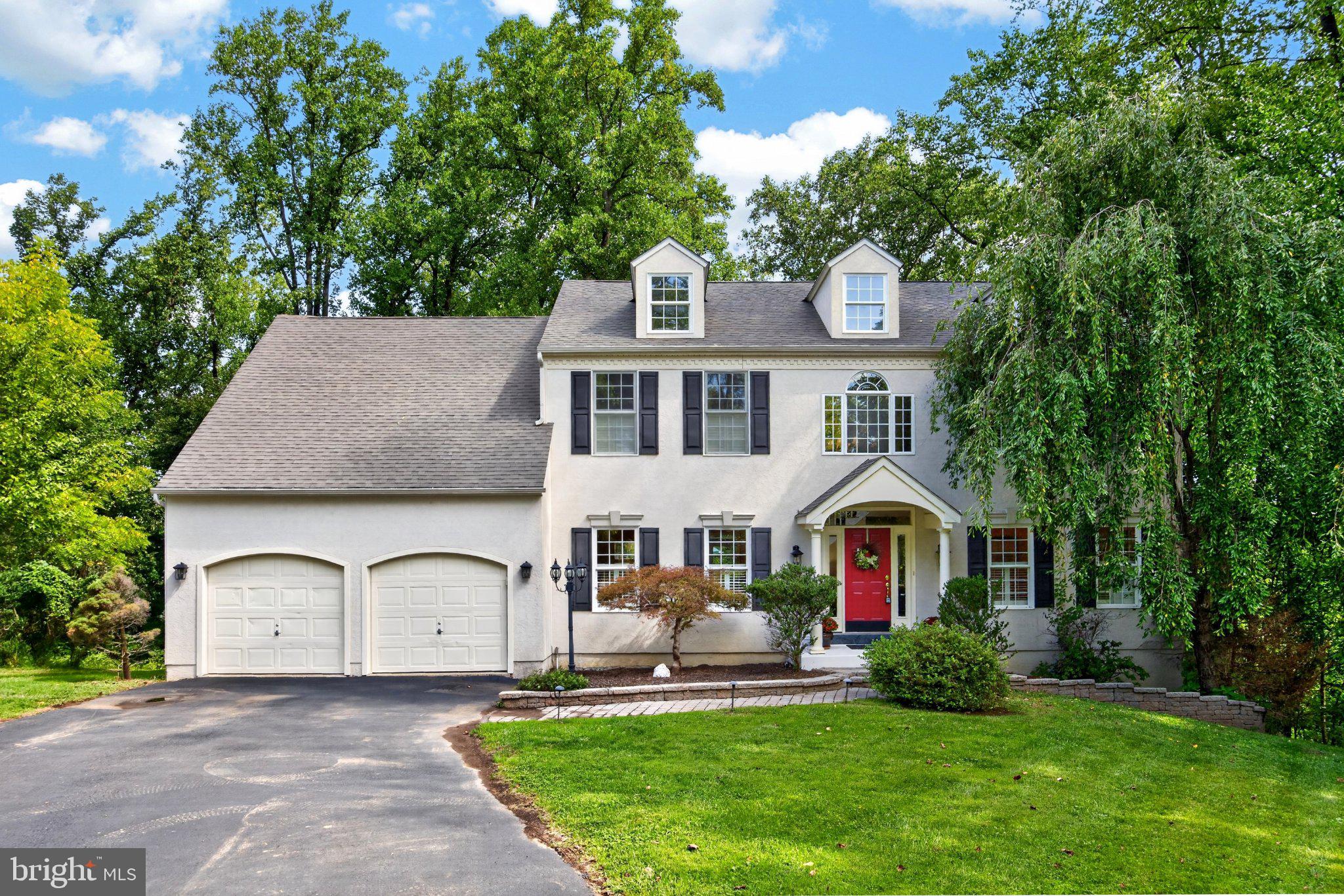 Perched at the top of a hill in the Village of Kimberton, this custom built 4 bedroom, 2.5 bath home offers a rare combination of privacy, beautiful natural surroundings, and an exceptional location in East Pikeland Township, within the highly regarded Phoenixville School District. Tucked among mature trees, on almost an acre,  the home enjoys peaceful, elevated views from the over-sized rear deck where, during the summer and fall, you feel like you’re on a nature retreat. Spend mornings with a cup of coffee watching the wildlife, enjoy evenings dining outdoors, or simply relax.  While the setting feels worlds away, you're just minutes from Kimberton Village, approximately 15 minutes to the Pennsylvania Turnpike, 20 minutes to the train station, about 45 minutes to Center City Philadelphia, and only a short drive to the vibrant shops, restaurants, breweries, farmers market, and year-round events that make nearby Phoenixville such a sought-after destination. Designed with both everyday living and entertaining in mind, the home is filled with natural light with windows that frame the surrounding landscape and it features 9 foot ceilings on the main floor.  A dramatic two-story foyer welcomes you inside, where wood flooring extends throughout most of the main level. The spacious living room and formal dining room,  with newer wood flooring, provide inviting spaces for holidays, celebrations, and gatherings, while the carpeted office offers a quiet place to work from home, read, or pursue hobbies. At the center of the home is the generously sized eat-in kitchen, featuring plenty of cabinets and counter space,  a brand new stove, quartz countertops, decorative river rock tile backsplash and a bright breakfast area with sliding doors leading to the deck. Whether preparing meals or hosting guests, the kitchen flows into the adjoining family room, where a gas fireplace creates a cozy focal point and the same peaceful treetop views can be enjoyed. The atmosphere throughout is elegant yet relaxed—equally suited for entertaining a crowd or enjoying a quiet evening at home. Upstairs, fresh neutral paint and brand-new carpeting create a move-in-ready feel. The spacious primary suite offers vaulted ceilings, a comfortable sitting area, two oversized walk-in closets, and a private bath with vaulted ceilings, a skylight, a large jetted soaking tub, and a separate shower. Three additional nice sized bedrooms, a hall bath, and the conveniently located second-floor laundry room complete this level. The walk-out lower level feels nothing like a traditional basement. Large windows and sliding doors fill the space with natural light, making it a true extension of the home's living areas. One side features wood flooring, recessed lighting, and a striking stone-surround gas fireplace—an ideal setting for entertaining, watching movies, or gathering with friends. The adjoining room with brand-new carpeting offers flexibility as a fitness area, game room, studio, play space, or additional office. A workshop provides plenty of room for projects and storage, and the attached two-car garage adds everyday convenience. Life in Kimberton offers the best of both worlds. Enjoy the charm of the historic village with its local café, artisan bakery, Kimberton Whole Foods, and community events, along with nearby parks, scenic country roads, and the popular Schuylkill River Trail. Just minutes away, downtown Phoenixville offers a blend of award-winning restaurants, breweries, boutique shopping, live entertainment, festivals, and outdoor recreation. This exceptional home combines the peaceful beauty of its hilltop setting with the convenience of having everything you need close at hand—a place where friends and loved ones will gather and lasting memories are made. Don't miss the video tour link.  Complimentary AHS Shield Complete one year Home Warranty.