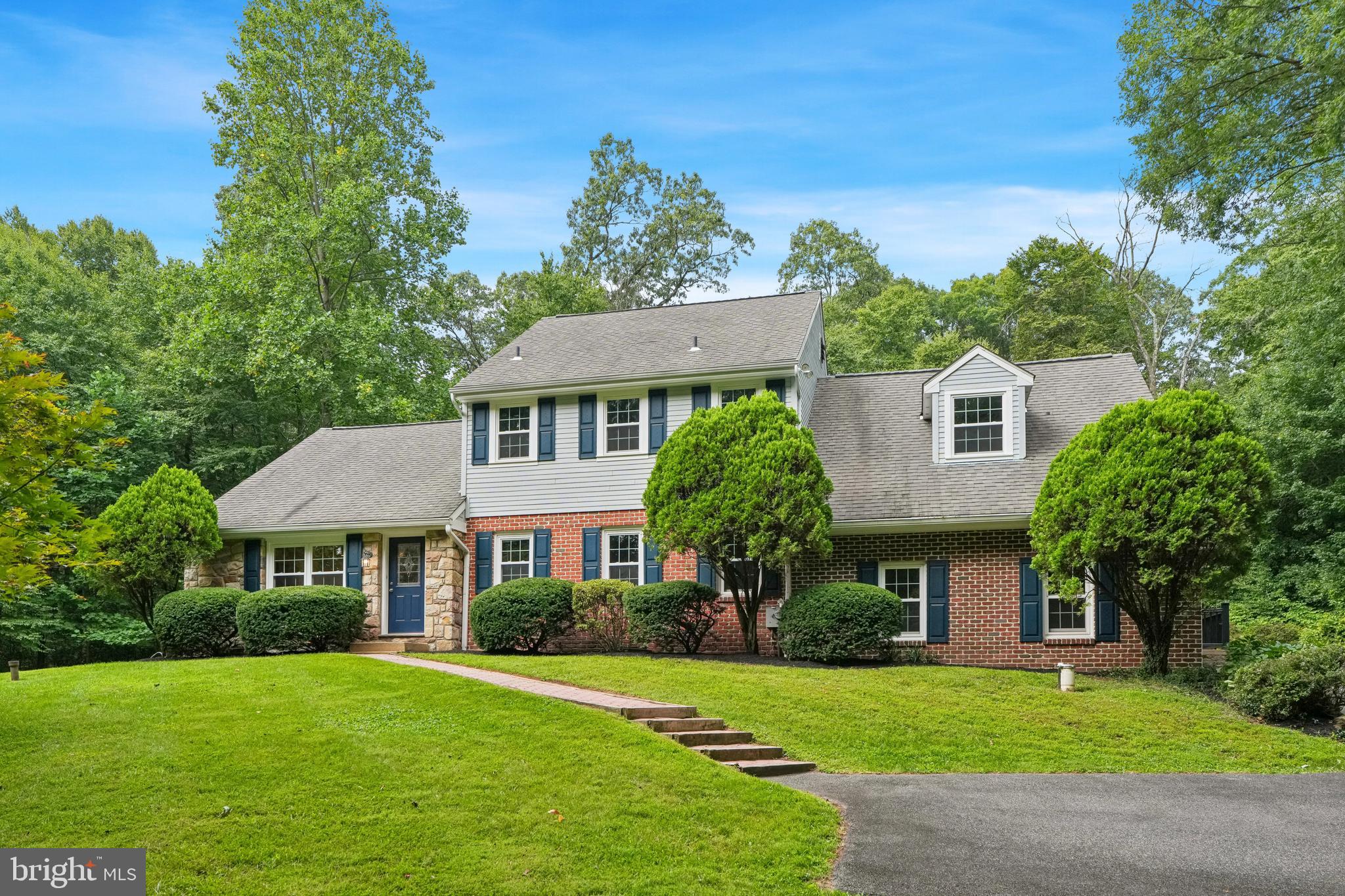 Set on more than 3.5 private wooded acres just minutes from the shops, dining, and natural beauty of St. Peters Village, 2435 St. Peters Road offers a unique blend of privacy, flexibility, and everyday comfort in the Owen J. Roberts School District.With nearly 4,000 square feet, 5 bedrooms, and 3 full bathrooms, the home offers a layout that easily adapts to a variety of lifestyles. Hardwood and porcelain plank flooring, recessed lighting, and abundant natural light create a warm and inviting atmosphere throughout.The renovated kitchen features stainless steel appliances, generous cabinetry, and ample granite counter space and opens seamlessly into the expansive great room with cathedral ceilings. Anchored by a fireplace and wood-burning stove, this inviting space is filled with natural light and serves as the heart of the home for both everyday living and entertaining. An additional bonus living area offers even more flexibility for relaxing, gathering, or recreation. The first-floor bedroom includes an en-suite bath and is well-suited for guests, multigenerational living, office space, or use as a primary suite.Outside, the setting is peaceful and secluded, with mature trees surrounding the property. Whether enjoying quiet mornings outdoors, entertaining friends and family, or exploring the nearby trails, parks, and charm of St. Peters Village, the property offers a lifestyle that feels private and connected to nature while still remaining convenient to everyday amenities.Additional features include a full basement with excellent storage and future potential, 3-zone heating, central air, updated windows, and an attached 2-car garage. The seller’s business plans changed, prompting a move unrelated to the home, creating a fantastic opportunity for the next owner. Don’t miss the chance to enjoy space, privacy, and flexibility in one of Chester County’s most scenic settings.