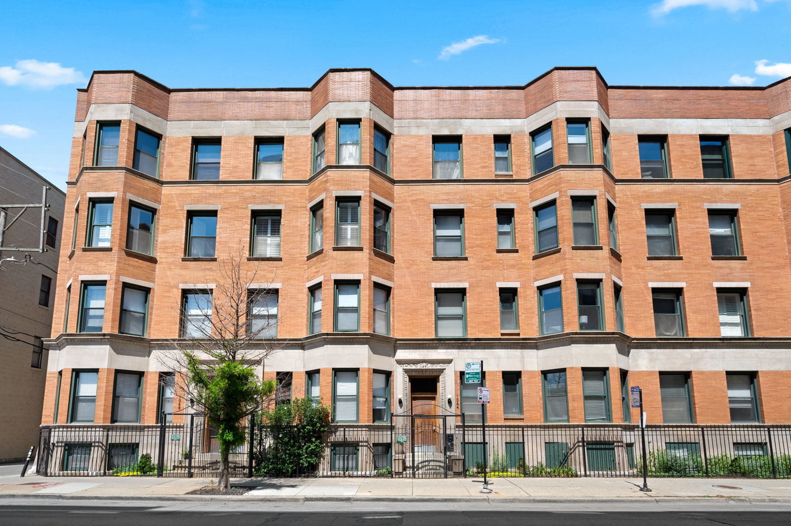 This sun-filled, south-facing Uptown condo in a classic brick courtyard building blends charm with modern comfort. A welcoming entry leads into a bright living and dining space with a bay window and soaring 9ft ceilings, while the kitchen offers 42" cabinets, granite countertops, stainless steel appliances, and a breakfast bar. From here, step out to an oversized private outdoor space that feels like an extension of the home-perfect for summer gatherings or quiet evenings. The primary bedroom impresses with a tray ceiling and a generous Elfa-organized closet. Marble bath offers a window which provides great natural light. 2nd bedroom is great for an office or guest room. Refinished hardwood floors, recessed lighting on dimmers, crown molding, in-unit laundry, extra storage, and a deeded secure parking space add to the appeal. Plus, rare vintage building was built with concrete between the floors, offering exceptional sound insulation and quiet living. All this, just minutes to the newly updated Lawrence Red Line stop, buses, the lakefront, and Montrose Beach. Owner is a licensed IL real etate agent