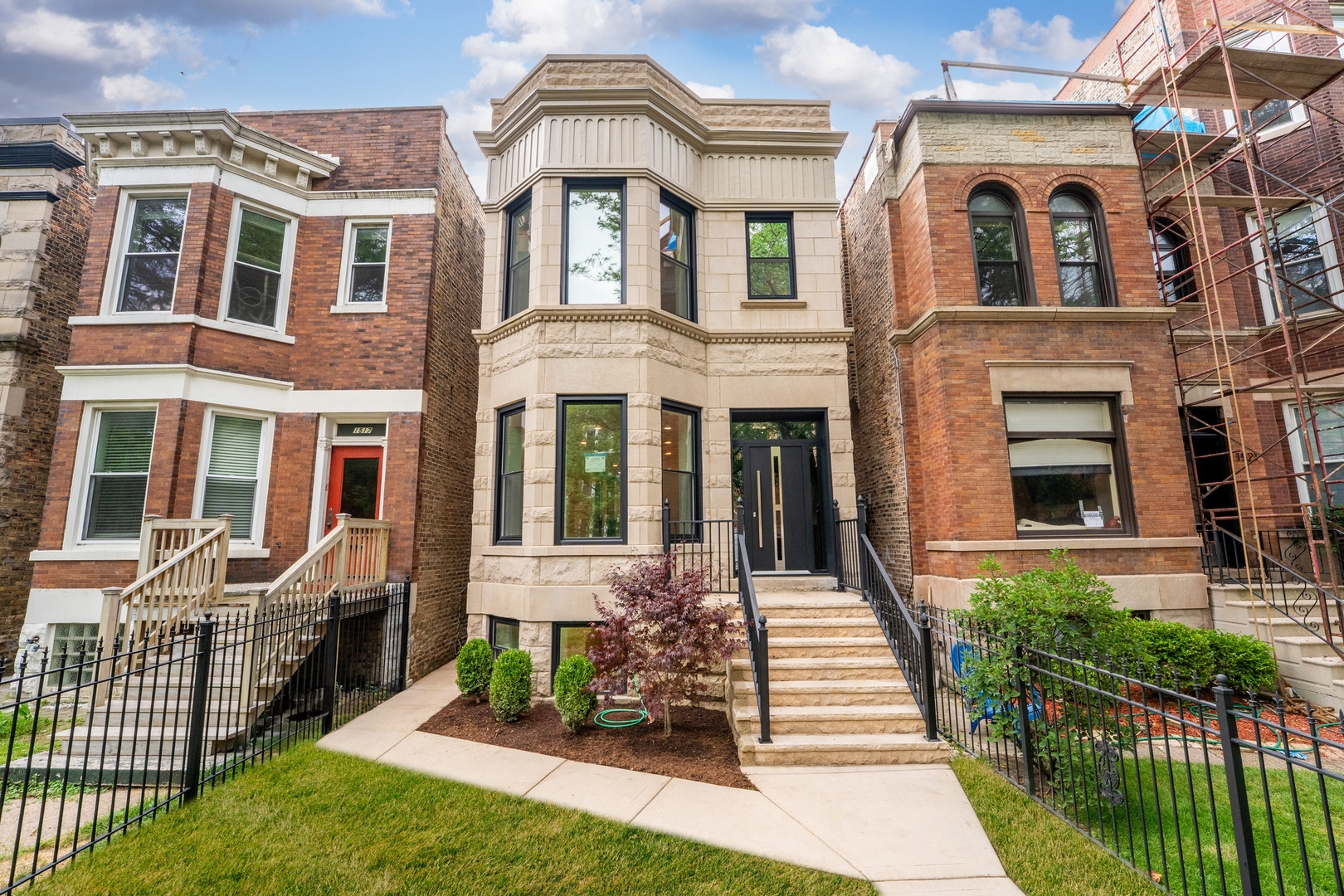 Exceptional, down-to-the-studs 2025 renovation of a classic Lakeview Greystone-moments to Hamilton Elementary, Southport Corridor dining and boutiques, Wrigley Field, neighborhood parks, and transit. Timeless Chicago architecture reimagined for turnkey living and comprehensively updated with all-new systems-including roof, siding, mechanicals-and a luxury appliance package (manufacturer warranties). The chef's kitchen features artisan-crafted cabinetry, Sub-Zero refrigerator and freezer, Wolf 36" gas range, built-in microwave drawer, and Bosch 800 Series dishwasher. The spa-level primary bath showcases Kohler fixtures, Toto toilets, and a sculptural Bordeaux soaking tub; all bedrooms include fully built-out custom closets. Design highlights include soaring 10'+ ceilings on the main and upper levels, white-oak flooring, a European black-metal entry door, and curated finishes. The finished lower level (9'+ ceilings) adds a custom wet bar with designer backsplash and a Danby wine cooler. Smart comforts include dual-zone high-efficiency HVAC, tankless water heater, Nest thermostats, CAT-5 wiring, whole-home audio, and pre-wired security. Outdoors, a low-maintenance backyard with premium turf and concrete walkways leads to a detached two-car garage with potential for a rooftop deck (contractor available separately). A luxury home built for comfort, longevity, and style-schedule your private tour today.