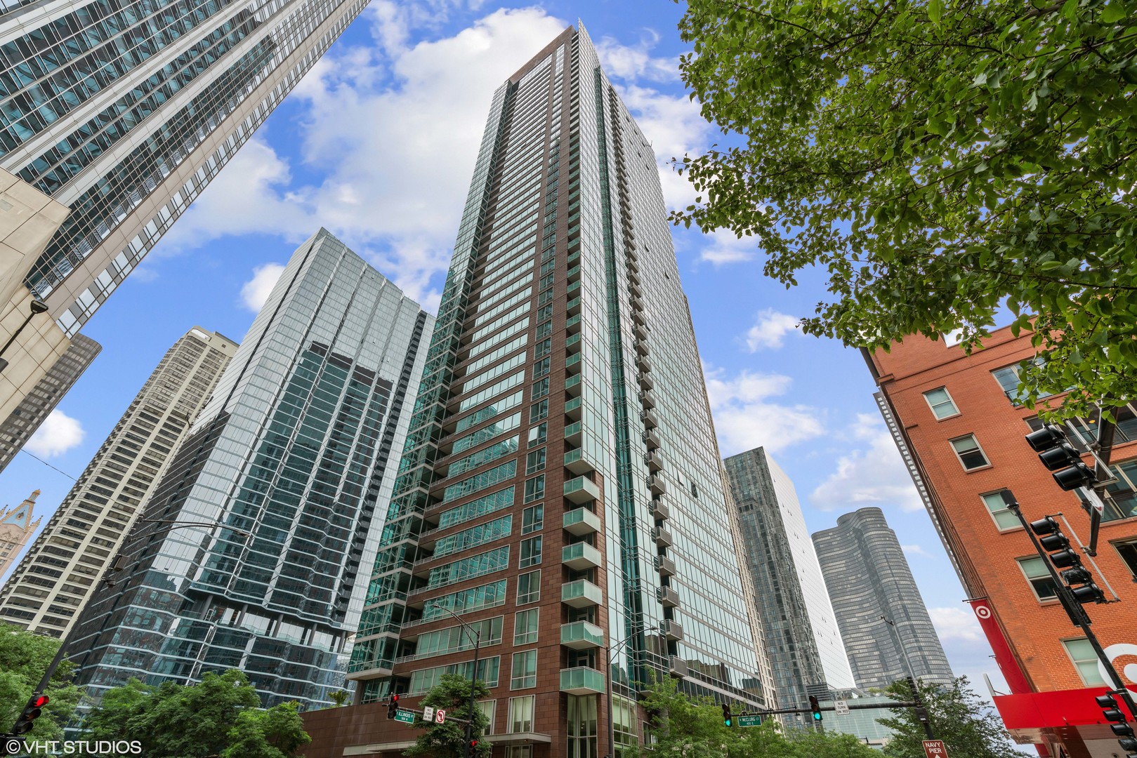 Step inside this bright and spacious 2 bed/ 2 bath condo in the heart of Streeterville. The large, split floorplan allows plenty of space for entertaining guests or relaxing with spectacular city and park views. Floor-to-ceiling windows bathe the unit in sunlight from all directions. The kitchen features top of the line stainless steel appliances, a sleek breakfast bar, wine fridge, and custom cabinetry. Retreat into the primary bedroom equipped with an oversized walk-in closet and spa-like en suite bathroom with double vanities, a large soaking tub, and walk-in shower. Additional highlights include an in-unit washer/dryer, outdoor balcony, and 1x deeded parking spot available for additional price. This full-amenity building includes a fitness center, 24-hour doorstaff, outdoor pool, sundeck, and party room.
