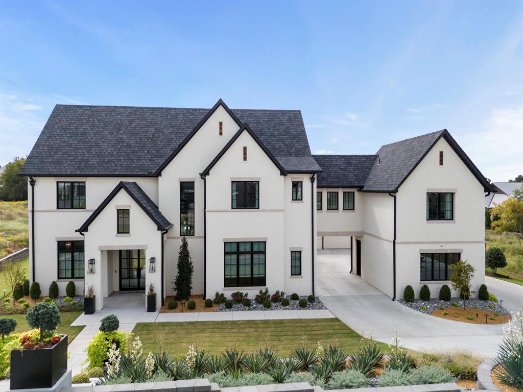 **Welcome to Norman’s Most Exclusive Neighborhood**This 6,000-square-foot custom masterpiece sits behind the gates of one of Norman’s most prestigious communities—where privacy, luxury, and sophistication meet.Every detail in this six-bedroom home was intentionally designed for elegance and comfort. Each bedroom features its own ensuite bathroom, providing every family member or guest with a private retreat. One bedroom includes custom built-ins, making it the perfect home office. Step inside and you’ll immediately notice the craftsmanship—from the La Cornue French range and water bottle filler in the gourmet kitchen to the nugget ice machine tucked away in the pantry.The layout was created for both family living and entertaining, with laundry rooms on both levels, a spacious upstairs loft/game room, and surround sound throughout the living room, primary suite, game room, and outdoor patio.Outdoors, luxury continues with an automatic-shade-covered patio overlooking a heated and cooled pool, perfect for year-round enjoyment. The home also includes an above-ground safe room, full exterior camera system for peace of mind, and a chandelier lift—because in this home, every detail is elevated.Car enthusiasts will appreciate the heated and cooled tandem two-car garage, offering both comfort and convenience in every season.This is more than a home—it’s a statement. Welcome to where luxury lives in Norman.