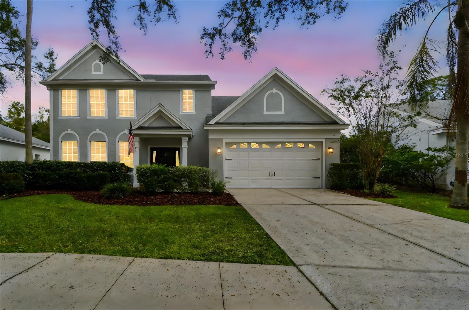 Under contract-accepting backup offers. Beautiful four bedroom, two and a half bath pool home on a stunning pond and wooded homesite in popular Wellington in Tampa Palms. Sophistication and luxury throughout. Over 2300 square feet of living space. NEW AC in 2025, freshly painted inside and out. Pavered entry leads to a large living room. Plank-style tile throughout the first floor starting in the foyer and extending to the living room, dining room, family room, kitchen and half bathroom. The renovated kitchen includes granite countertops, shaker-style white cabinetry with crown molding, a ceramic farmer’s sink with one-touch faucet, subway tile backsplash, vented hood system, pot filler, smooth top range, stainless steel French door refrigerator, microwave, and Bosch dishwasher, as well as a large center island that’s perfect for casual dining.
The primary bedroom suite includes an 18x16 bedroom, a large walk-in closet, and a bathroom with double vanity, garden tub, walk-in shower, private water closet, and linen closet. 
Other upgrades include crown molding, 5 ¼ inch baseboards, wainscoting, custom built-ins in the family room and the dining room, a drop zone as you enter from the garage, two additional storage closets (Can’t have enough storage.), fenced yard and more. Roof is only 9 years old. 
Sit out on the pavered lanai overlooking the sparkling pool and enjoy Florida living at it finest. Community amenities include Hampton Park at the front of the community with a playground, pavilion, basketball courts, tennis courts, and racquetball courts. The community pool, gym, courts for various sports and clubhouse are located at Compton Park. The home is within walking distance to Chiles Elementary School and is near Liberty Middle School and Freedom High School. There are various shopping, dining, and recreational options in Tampa Palms, and the location provides access to I-75, I-275, the University of South Florida, James A Haley VA Hospital, Moffitt Cancer Center, Busch Gardens, Premium Outlet Mall, Shoppes at Wiregrass, downtown Tampa, and Tampa International Airport. Pride of ownership evident. Hurry!