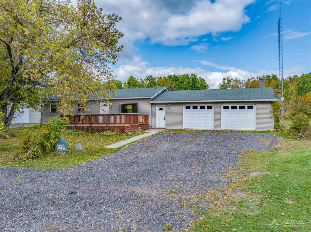 Enjoy peaceful country living on 40 acres close to town. This comfortable ranch home has 3 bedrooms and 1 bathroom with an attached garage and detached garage. The East Branch of the Tittabawassee River runs through the southwest corner. This home is surrounded by abundant wildlife. Property has a pond with a natural flow. House renovated in 2025. River frontage is a rough estimate.