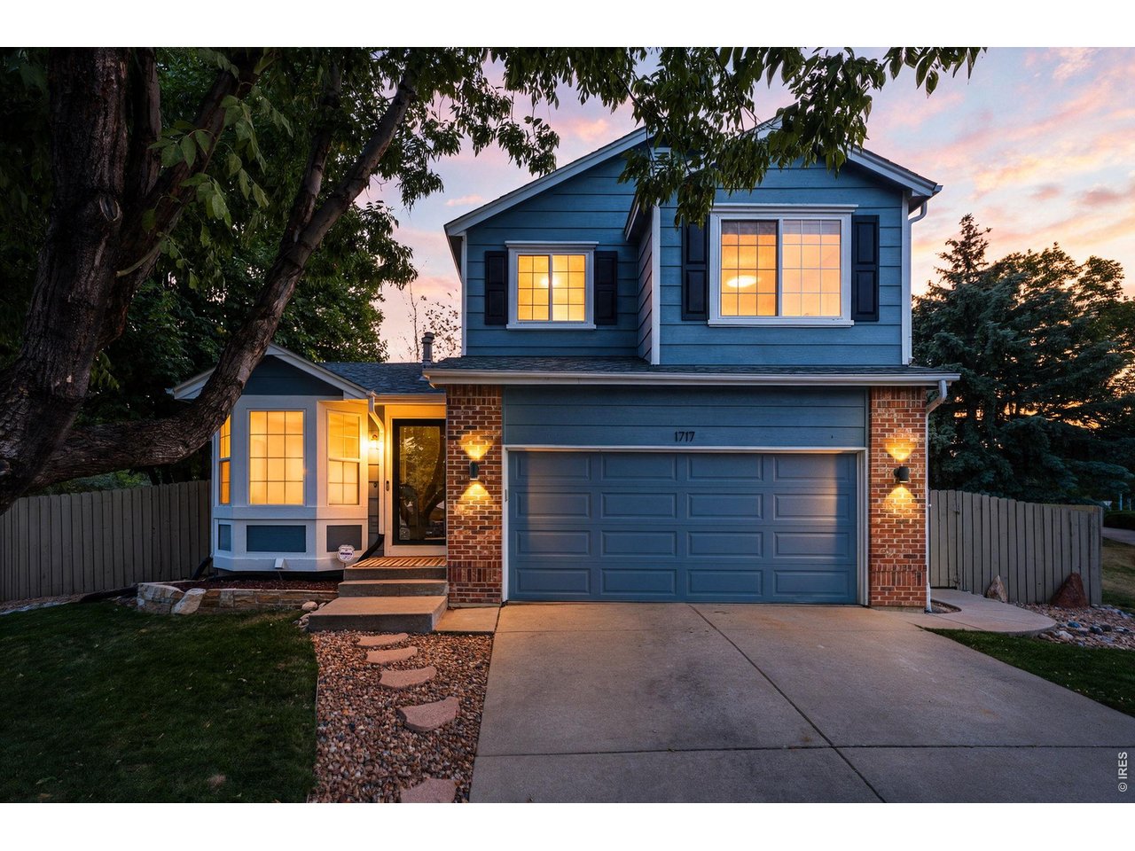 Welcome home to a quiet cul-de-sac in Superior's beloved Rock Creek neighborhood, where this updated four-bedroom, four-bath home sits on a grassy, fully fenced and tree-shaded lot made for backyard living. The sellers invested over $90,000 in upgrades during their tenure so the hard work is already done! Cozy up to the see-through gas fireplace shared by the living and family rooms with vaulted ceilings and brand-new wide-plank flooring throughout the main level. The kitchen features granite counters, a gas range and a peninsula for quick breakfasts, with a beverage bar and wine fridge ready for entertainment. Step through the new sliding door to the large covered patio and deck, then out to a sprawling yard and fire pit ready for s'mores. Upstairs, three bedrooms include a primary suite with double sinks and a custom closet system, with a second full bathroom off the hall. The recently built finished basement adds a fourth bedroom, a big rec room for movie nights or a home gym, adding a 3/4 bath and laundry. Replaced windows throughout, a newer furnace and water heater and updated AC units keep things comfortable and efficient, while a Moen Flo smart water shutoff, smart lock and doorbell camera add peace of mind while away. The garage is EV-charger ready with overhead racks for your seasonal tires or outdoor gear. Low HOA dues of $323 a year bring community pools, parks and trails, with Superior Elementary, Eldorado and Monarch schools just minutes away. With Boulder, Denver and airports within easy reach, your new chapter begins here!