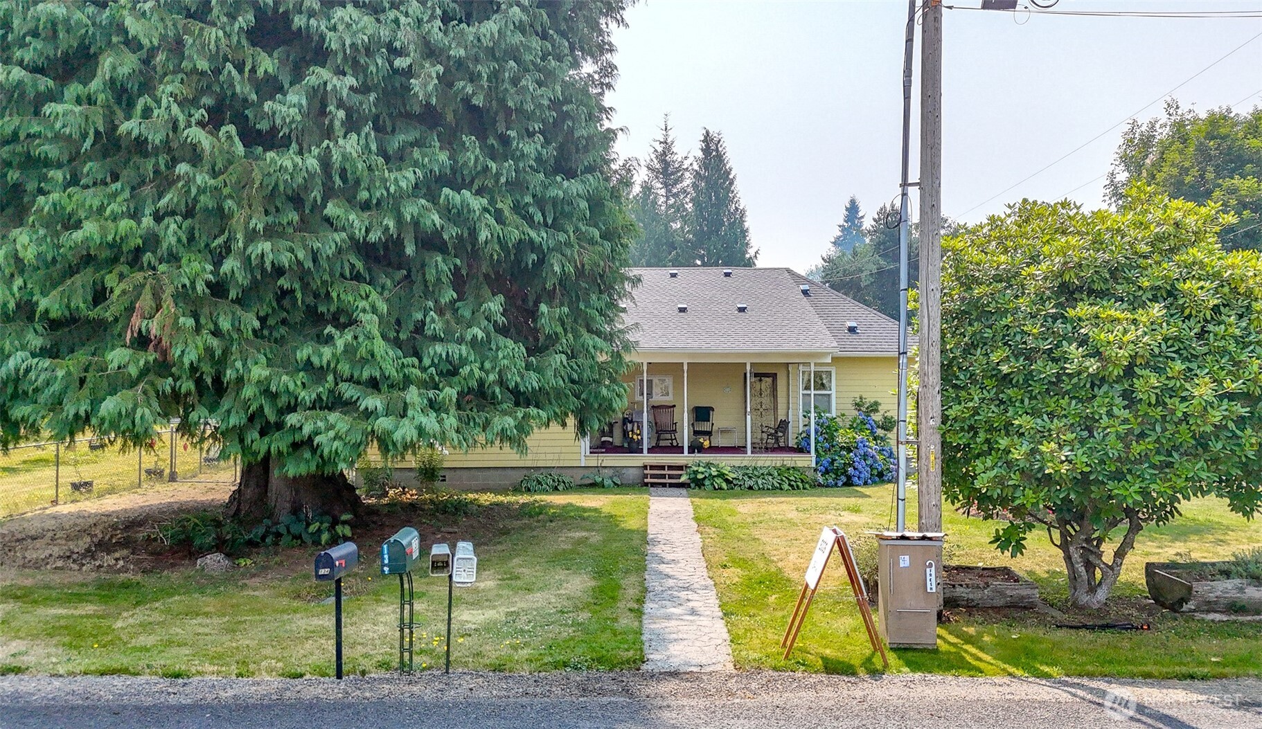 Pride of ownership shows with this beautiful, upgraded home. Built with quality in 1950 this is a must see. This home boasts massive family room, and three nice sized bedrooms, and plenty of space for family and friends. Beautifully landscaped property with an abundant variety of plants, apple and pear fruit trees, and grapes. There is even a nice pond with resident goldfish. All the roofing is new, under a year old. There is RV parking with hook ups. There is a 1bd cottage /apartment at the back of property which is attached to large shop space. Plenty of storage, and additional covered parking as well. Only 5 min away from Mayfield & Riffe Lake. Great fishing, hunting, and boating close by. White Pass Ski Resort 1.5hrs away.