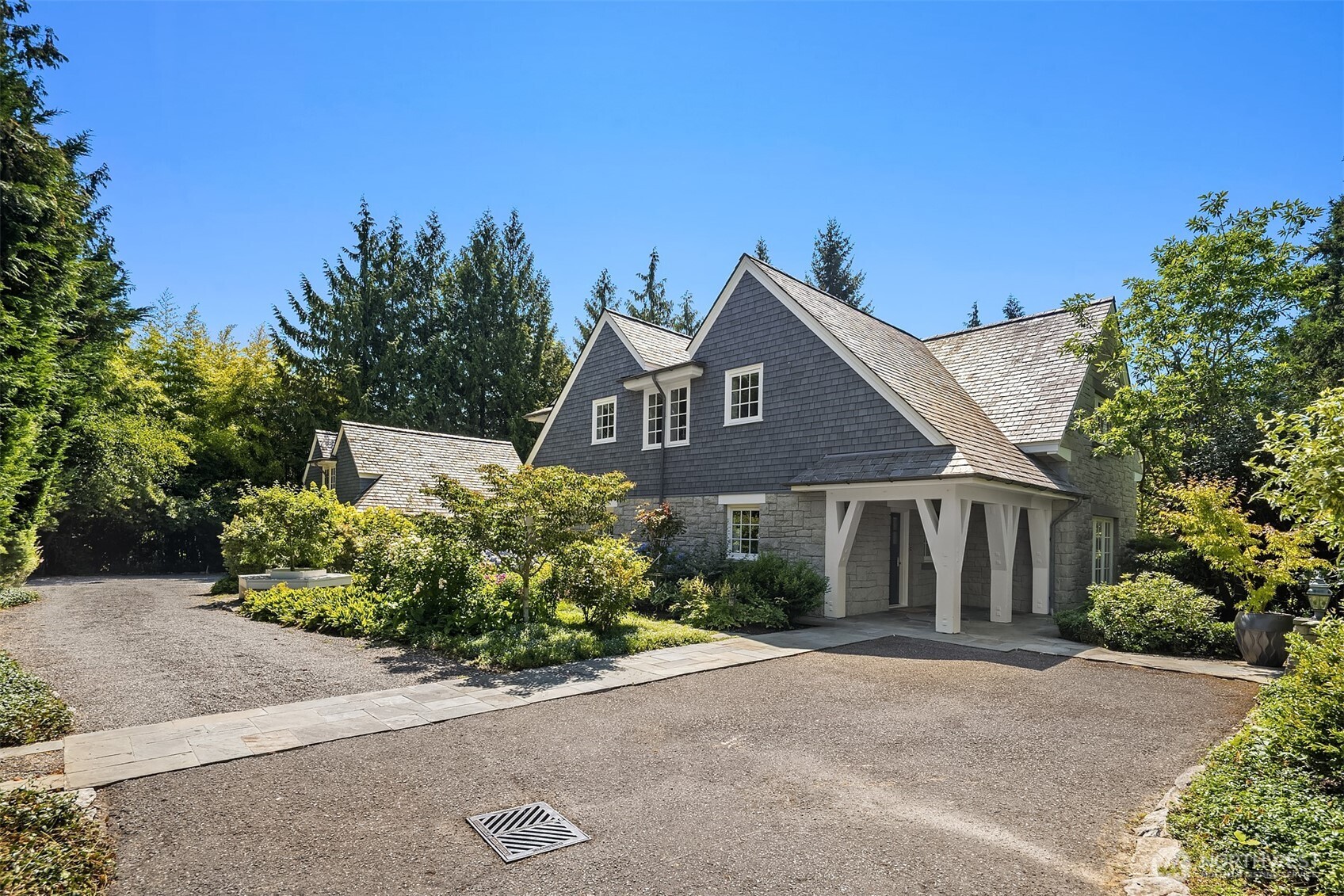 Traditional architecture set against a backdrop of greenery.