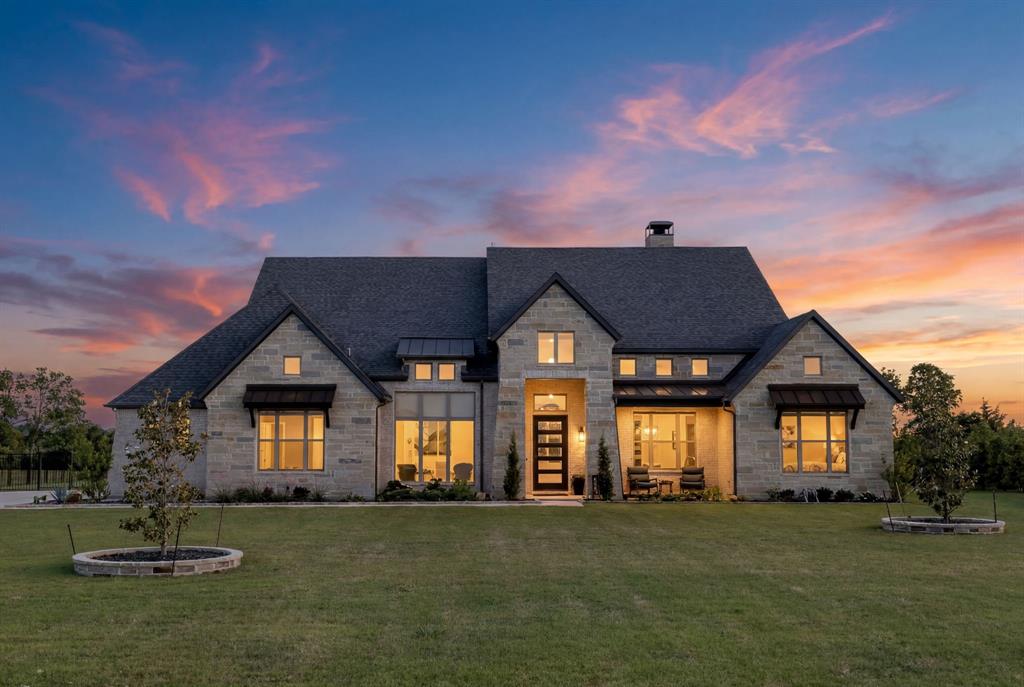 Experience luxury country living in this highly upgraded one-story home nestled on a stunning one-acre lot in an exclusive gated acreage community in McKinney. Designed for both everyday comfort and exceptional entertaining, this home features a resort-style backyard with a luxurious swimming pool surrounded by a striking cactus garden, expansive covered patio, built-in outdoor kitchen, and dramatic wall slider doors that create seamless indoor-outdoor living. Inside, the spacious open-concept floor plan is highlighted by soaring vaulted beamed ceilings, designer finishes, and upgrades at every turn. The chef’s kitchen is a true showpiece with a commercial-grade gas range, convection oven, abundant prep space, and premium craftsmanship throughout. Split bedrooms offer privacy, while the functional flow is perfect for both daily living and hosting guests. A North South elevation and large windows help keep you comfortable all year round while enjoying your breathtaking views! Located outside city limits, this gated neighborhood offers the rare advantage of acreage living with valuable tax-saving benefits—all while being just minutes from the conveniences of McKinney. A truly exceptional property with more upgrades than can be listed!