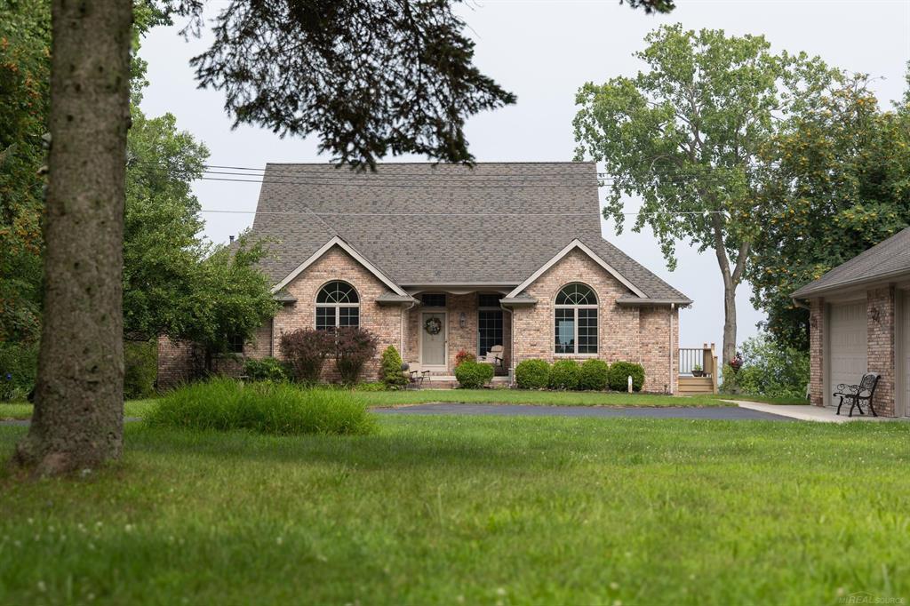 Frank Walding built brick home with daylight basement on the best beach/lowest bank between Port Sanilac and Lexington. Very secluded 125 ft frontage location with 100's of wooded acres to the north. Beautiful 1.13 acre location on the lake only 4 miles north of Lexington. Main floor 3 bedrooms or two with office (nice double door on the one bedroom off of great room). The MBR, great room and dining all have beautiful lake views. Daylight basement has one bedroom facing the lake and a full bath. Full kitchen as well as huge countertop for nice gatherings and a huge open space for added sleeping or lounging. Two gas fireplaces, a Generac generator and 3 1/2 car unattached garage with loft space for added storage or possible bunk house. Walding built solid construction with 2x6 walls and Anderson windows. Tyvek wrapped and plenty of foam panels used in basement walls and under poured basement floor. Cellar included in the basement accessed thru storage/hvac room. Newer HVAC within last few years and recent septic pump out. Natural gas and well, however, city water at M25 if desired. Some neighbors considering so potential cost sharing maybe possible. Do not enter property, however, can be seen via Aitken county lane.