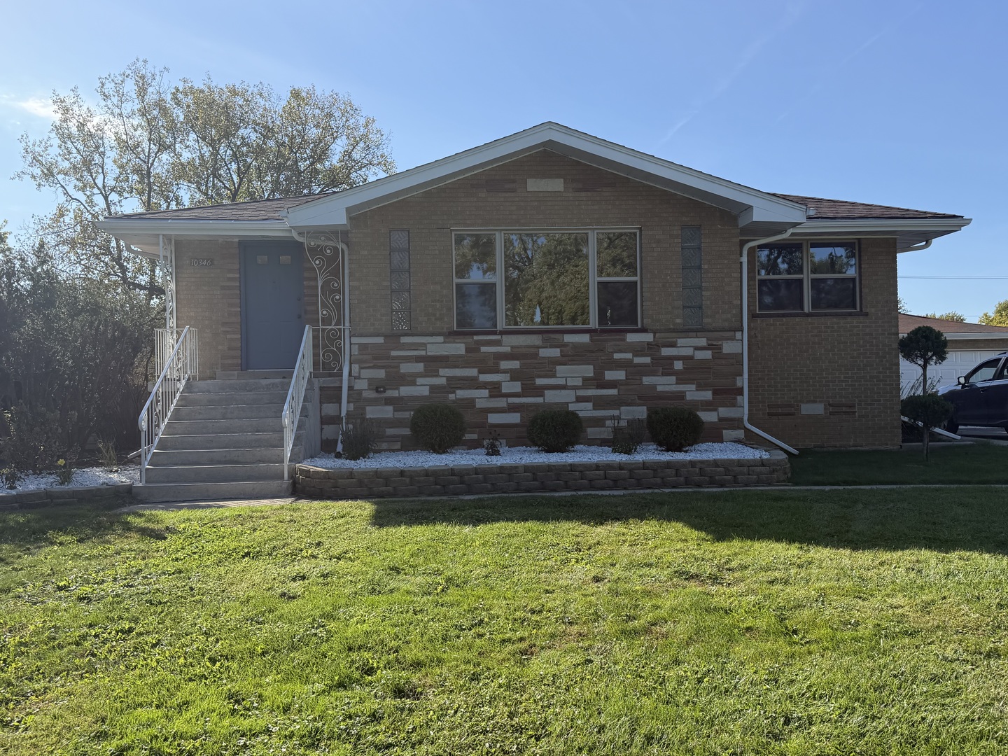 Completed updated home on huge double lot.  Owner did not spare any expenses on this beautiful home.  Perfect for large families or related living.  Home has two modern kitchens and 3 bedrooms on each level.  Bathrooms updated with a luxury shower system with rainfall.  New flooring throughout home.  Large yard is perfect for entertaining with fireplace in the covered patio area and fire pit in the yard.  Huge garage with plenty or room for all your needs.  Perfect Palos Hills location close to shopping, restuarants and expressways.  This one will not last!