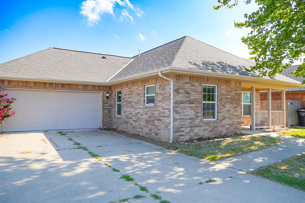 Welcome to this charming 3-bedroom, 2-bathroom home offering comfort, convenience, and easy living. A welcoming covered front porch invites you inside to a cozy, carpet free interior with a functional layout designed to make the most of every square foot. The attached two car garage includes the added peace of mind of an in-ground storm shelter.Step outside to a fully fenced backyard with space to relax, entertain, or enjoy gardening. Conveniently located near shopping, dining, schools, and major highways, this home offers an ideal blend of comfort and accessibility. Whether you're searching for your first home, looking to downsize, or simply looking for a place to call home, this move in ready property is ready to welcome its next owner!