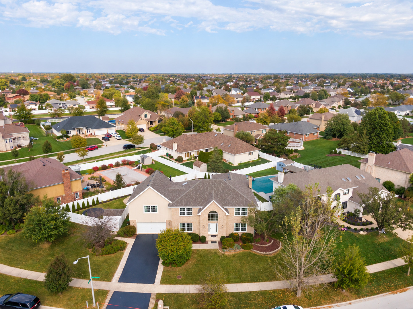WELCOME HOME TO THE HIGHLY SOUGHT-AFTER PHEASANT LAKE SUBDIVISION & ANDREW SCHOOL DISTRICT! This stunning 4-bedroom, 3.5-bath all brick 2 story home offers OVER 4,200 SQ. FT. ABOVE GRADE PLUS A FULLY FINISHED BASEMENT! Featuring 2 expansive bonus rooms, multiple entertaining spaces, extensive 2026 updates, and your very own backyard oasis with a heated saltwater in-ground pool, slide, and diving board, this home truly has it all! Step through the front door into a grand entryway featuring soaring cathedral ceilings, an exposed staircase, beautiful hardwood flooring, and fresh paint (2026). The formal dining room features elegant tray ceilings with lovely hardwood flooring. While the spacious living room with French doors opens to the inviting family room with a cozy brick gas fireplace; both rooms feature new carpeting and paint (2026). You'll love the gorgeous heated and cooled all-season room with 3 sliding glass doors & built-in cabinetry! The spacious eat-in kitchen offers bar seating, pantry closet, double ovens, gas cooktop, dishwasher, and stainless steel refrigerator. Sliding doors lead directly to your backyard paradise! A convenient half bath and main-level laundry complete the first floor. GET READY FOR AMAZING SUMMERS! Your private backyard oasis features a HEATED SALTWATER INGROUND POOL with a slide and diving board, 6-foot PVC privacy fencing, newer landscaping, built-in trampoline with underground drainage tile, sprinkler system & storage shed. Perfect for entertaining or relaxing poolside! Upstairs, discover 4 spacious bedrooms PLUS 2 MASSIVE BONUS ROOMS! The primary suite features tray ceilings, hardwood flooring, and a walk-in closet. The completely remodeled spa retreat primary bathroom (2026) showcases a double vanity, custom walk-in shower, spa like soaker tub, makeup counter & a smart toilet. Attached to the primary bedroom is an incredible Wellness Retreat & gym above the garage with cathedral ceilings, hardwood flooring, recessed lighting, walk-in closet, SAUNA, and attic storage! Workout equipment is negotiable. The additional bedrooms feature newer carpeting (2026), while the hallway bathroom offers a double vanity, new faucets, and skylights. One bedroom features French doors leading to the second expansive bonus room with hardwood floors and a closet, ideal for an office, recreation room, playroom, or flex space! AND THERE'S MORE! The FULLY FINISHED BASEMENT offers tall ceilings, a spacious family room with a SECOND gas fireplace, and a pool table that STAYS! The impressive kitchenette features abundant glass-front cabinetry, bar seating, stainless steel refrigerator, sink, built-in wine rack, and dining area. A full bathroom with walk-in shower, additional laundry room with washer and electric dryer hook up, and under-stair storage provide incredible flexibility and potential for related living! Walkout access to the attached 2.5-car garage adds convenience. Also, An EV CHARGER ready to go for your electric car! Major components: NEW roof (2026), driveway sealed (2026), ejector pump (2025), sump pump (2024), 2 water heaters (approximately 2006 and 2017), all front facing windows (2020) and 4 HVAC systems serving the home and additions, including an A/C unit for the upstairs bonus room (approximately 2017/2018). An exceptional combination of space, comfort, updates, and entertainment! Schedule your private showing today!
