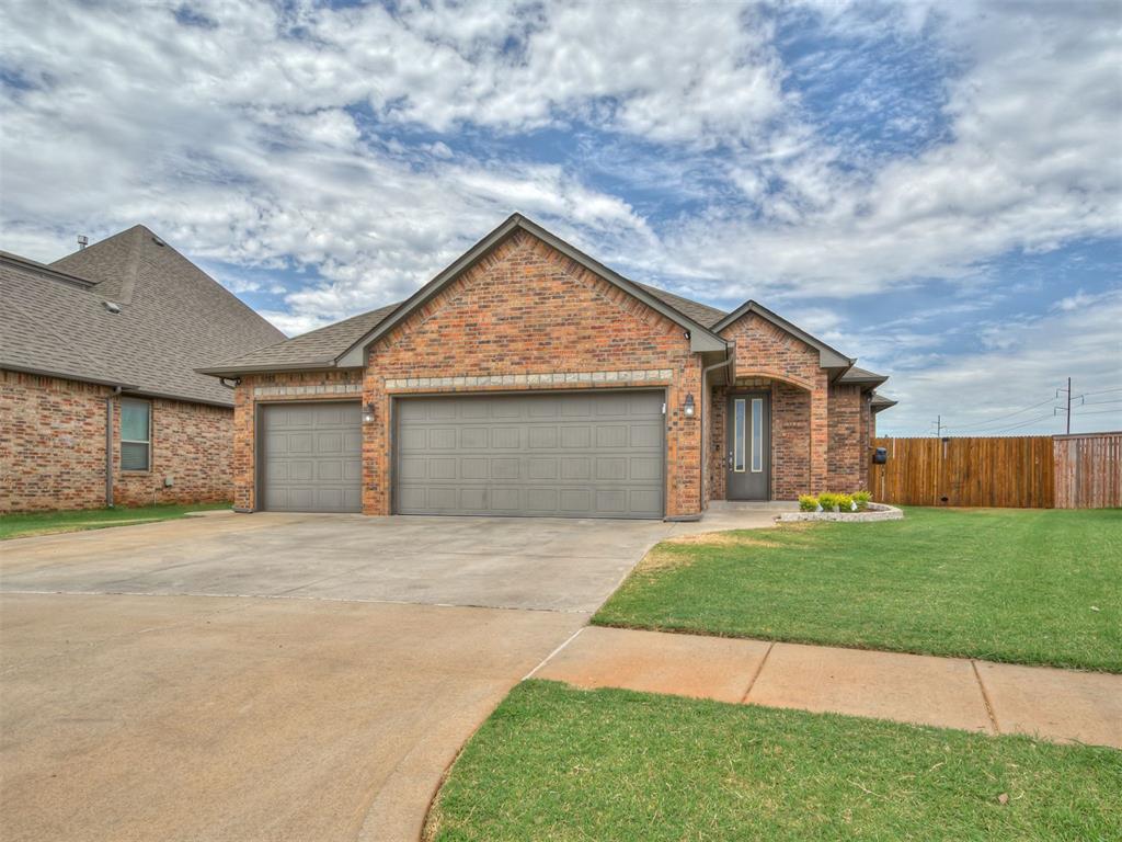 Nestled in the heart of the desirable Deer Creek community, this beautifully designed home offers the perfect mix of comfort, style, and convenience. Located just minutes from top-rated schools, popular shopping, dining, and the Kilpatrick Turnpike, everything you need is right at your fingertips. Inside, you’ll find an open-concept layout featuring a spacious great room with a stunning statement fireplace, wood beam ceilings, and elegant granite countertops in the kitchen. With plenty of cabinet space and direct access to a covered patio, this home is made for entertaining and everyday living. The home features three well-sized bedrooms, each with built-in closets that offer generous storage. The primary suite is a true retreat with high ceilings, wood accents, and a spa-inspired ensuite bathroom featuring a walk-in shower, soaking tub, double vanity, and a large walk-in closet. Additional features include a spacious 3-car garage perfect for vehicles, a home gym, or workshop space—plus a built-in storm shelter for added safety. This home truly checks every box—location, design, space, and peace of mind. Come see it for yourself and fall in love!