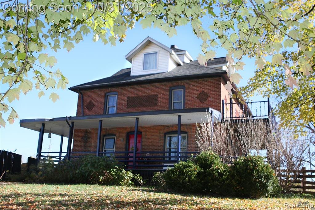 Timeless Brick Colonial on Expansive Acreage! Step back in time with this stately 1900-built brick colonial offering charm, space, and opportunity. Nestled on 4 beautiful acres (with an optional additional 2.25-acre vacant parcel on M24 included with an additional 163' of frontage), this property combines historic character with endless potential. Featuring two barns, two garages, and a shed, the possibilities are abundant—whether for hobby farming, storage, or even transforming one barn into an event venue (with township approval). The home itself is ready for your personal touches and creative vision. Situated on a main road with high visibility, this property may also offer commercial zoning potential (with township approval)—ideal for a business, venue, or investment opportunity. While the home needs some updates, the location, acreage, and flexibility make it a rare find! Newer furnace, windows, pressure tank. Updated electrical in barns and garage. New Barn Roof, floors and lean-to. Bring your ideas and make this one-of-a-kind property shine again.
