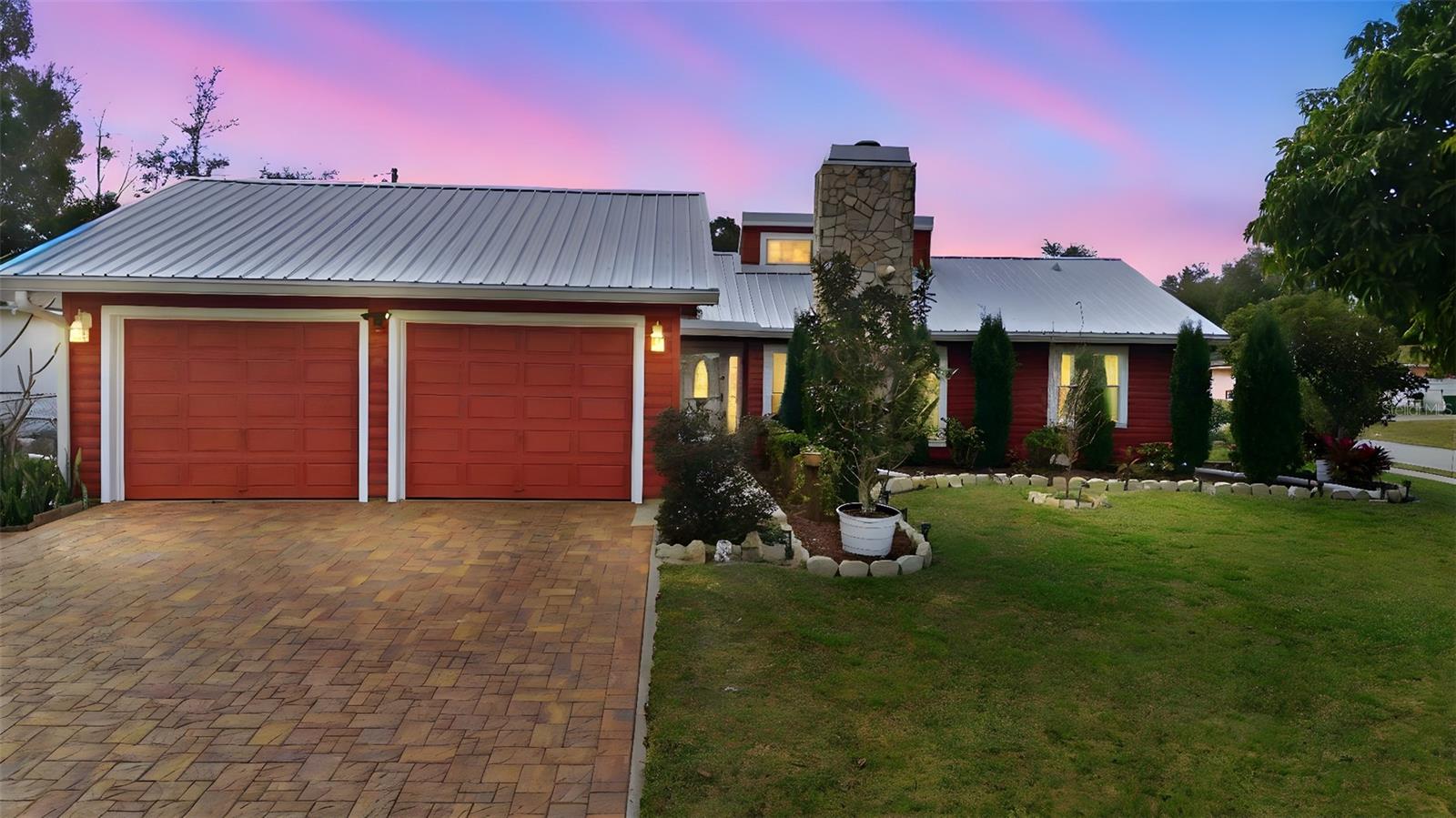 Sitting Pretty on a Prime Corner Lot (85x125)– Pride of Ownership Shines! Welcome to this beautifully maintained, one-owner home where quality, care, and thoughtful updates are evident throughout. The seller has poured years of pride into maintaining and improving this property—and it truly shows.This home features a fully remodeled kitchen from top to bottom to feature: abundant soft close cabinets, gorgeous quartz countertops, new appliances, subway tile, farm sink and new flooring, remodeled bathrooms, no carpet, a metal roof, 2021 HVAC, and new windows throughout, plus charming dormers that flood the home with natural light. The exterior is just as impressive with Western Red Cedar siding (termite-proof), lush professional landscaping, and a shark-coated sidewalk and pavered driveway for durability and curb appeal.Enjoy peace of mind with a Generac whole-house generator and a fully fenced private backyard featuring both vinyl and chain-link fencing. Outdoor living is a dream with a paver patio, pavilion with hot tub that conveys, and fruit trees galore—including lemon, dragon fruit, cherry, tangerine, guava, and mango.Inside, you’ll find volume ceilings, a coquina wood-burning fireplace, and a spacious 20x11 Florida room included in the square footage, complete with a split AC unit—perfect for year-round enjoyment, split plan and inside utility room. The home also offers wheelchair accessibility, a 10x10 tool shed, and excellent garage space with a 24x22 attached garage plus a 20x12 detached one-car garage.Located across from a greenbelt with no neighbors in front and just minutes from Dewey Brewster Park, this home offers privacy, convenience, and a peaceful setting. *One-owner home * Must see to truly appreciate * Pool table does not conveyThis is a rare opportunity to own a home that has been lovingly cared for and meticulously maintained over the years. Homes like this don’t come along often—schedule your showing today!