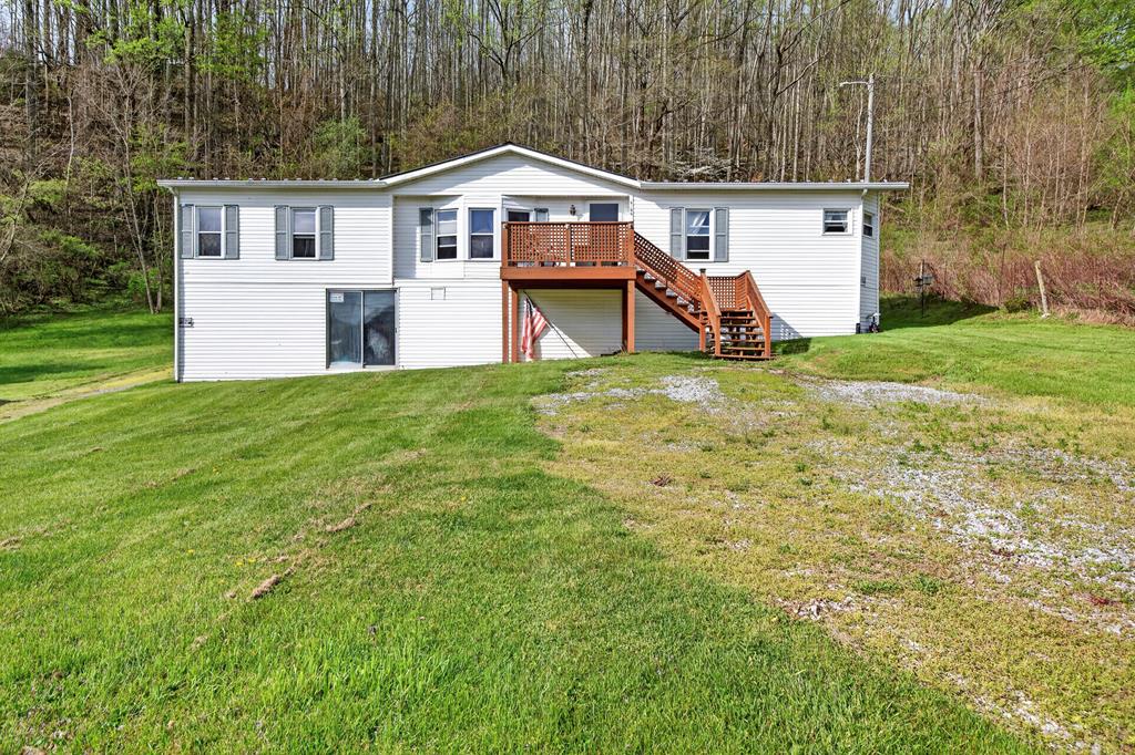 Come discover this beautifully maintained and thoughtfully updated 3-bedroom, 2-bath home offering comfort, functionality, and scenic charm. From the moment you step inside, you'll appreciate the well-designed floor plan that provides a natural flow between living spaces, perfect for both everyday living and entertaining. The home features attractive flooring and stylish finishes throughout, creating a warm and inviting atmosphere in every room. The spacious kitchen and living areas are ideal for gathering, while the bedrooms offer privacy and relaxation. Each detail has been carefully considered to maximize both comfort and usability, making this home truly move-in ready. Step outside and enjoy a generously sized yard that borders state conservation land, providing added privacy and a peaceful natural backdrop. Whether you're enjoying morning coffee or hosting an evening get-together, the outdoor space offers endless possibilities. The property also boasts two separate driveways, allowing for ample parking and convenient access from both the front and rear of the home. Take in the beautiful mountain views that surround the property, offering a serene setting that's hard to beat. Despite its tranquil feel, the home is located just minutes from downtown, where you'll find shopping, dining, and everyday amenities close at hand. Outdoor enthusiasts will love the proximity to popular attractions, including the Appalachian Trail, Hungry Mother State Park, and the nearby national forest, providing year-round opportunities for hiking, biking, and exploring nature. This home offers the perfect balance of comfort, convenience, and natural beauty—don't miss your chance to make it yours.