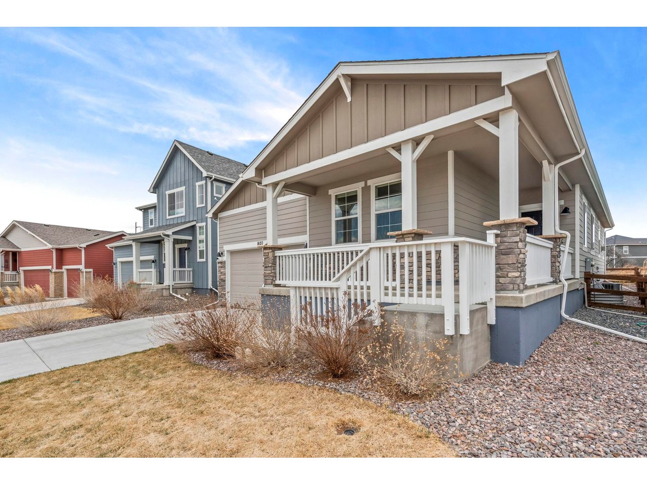 Backing to open space with incredible views! This newer south-facing 4-bedroom ranch style home features an open floor plan with a vaulted living room and gas fireplace. The kitchen offers quartz countertops, stainless steel appliances, gas range, a large island, and a generous pantry, making it a great space for cooking and gathering.The primary suite includes a walk-in closet and a luxurious bath, and both full bathrooms feature dual vanities. A full unfinished basement with 9-foot ceilings provides great potential for future expansion, plus a 2-car attached garage.Step outside to a fully landscaped yard with a deck and gas fire pit, perfect for enjoying the open space and views. All three mounted TVs are included. Conveniently located near the Power Trail with easy access via the new pedestrian bridge, and close to great schools, restaurants, shopping, and Southridge Golf Course.